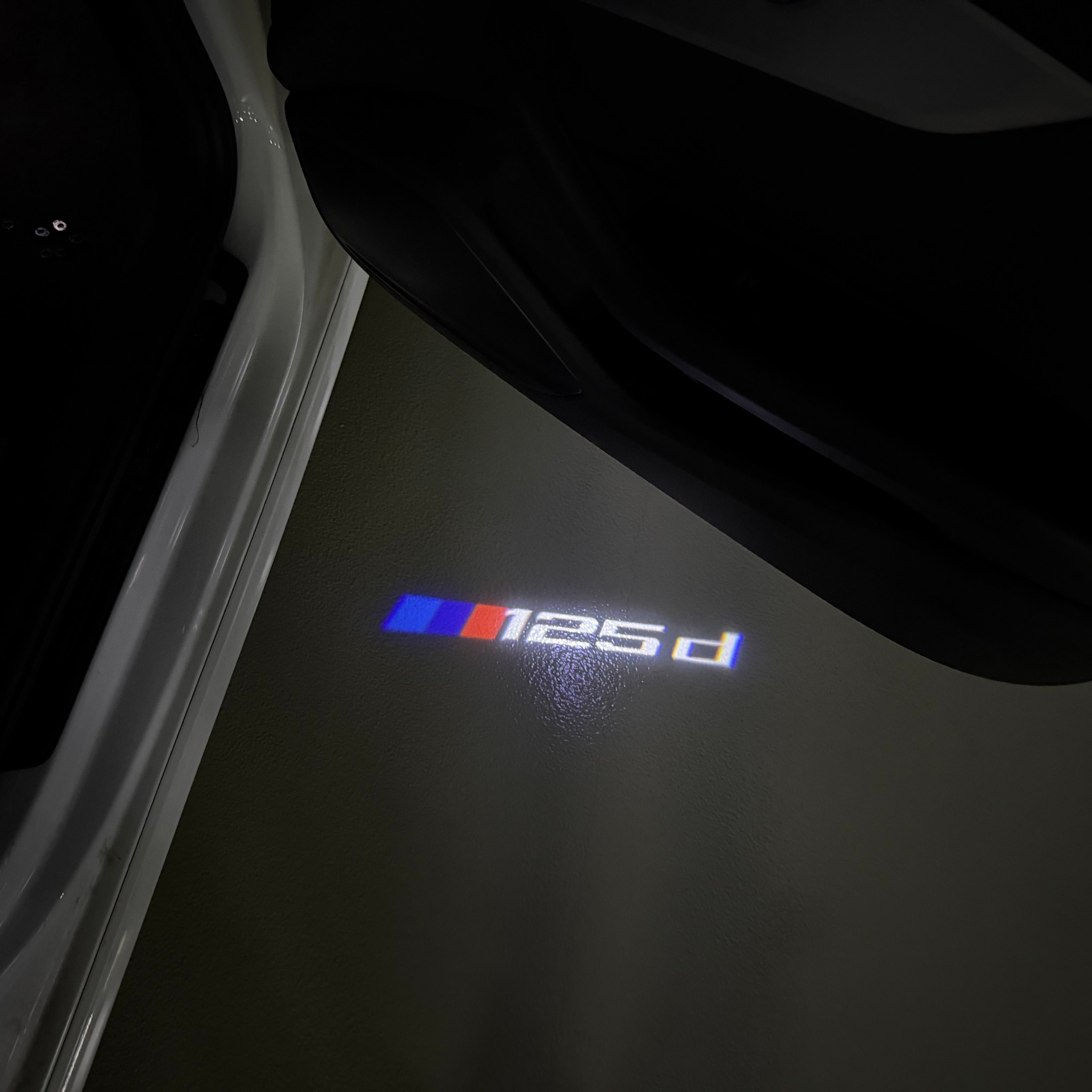 BMW  1 SERIES  125  LOGO PROJECTOT LIGHTS (quantity 1 = 1 sets/2 door lights) Nr.6024t18