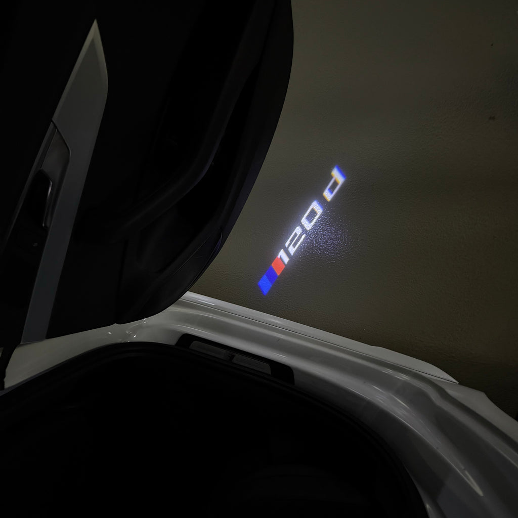 BMW 1 SERIES  120   LOGO PROJECTOT LIGHTS (quantity 1 = 1 sets/2 door lights) Nr.6024q14