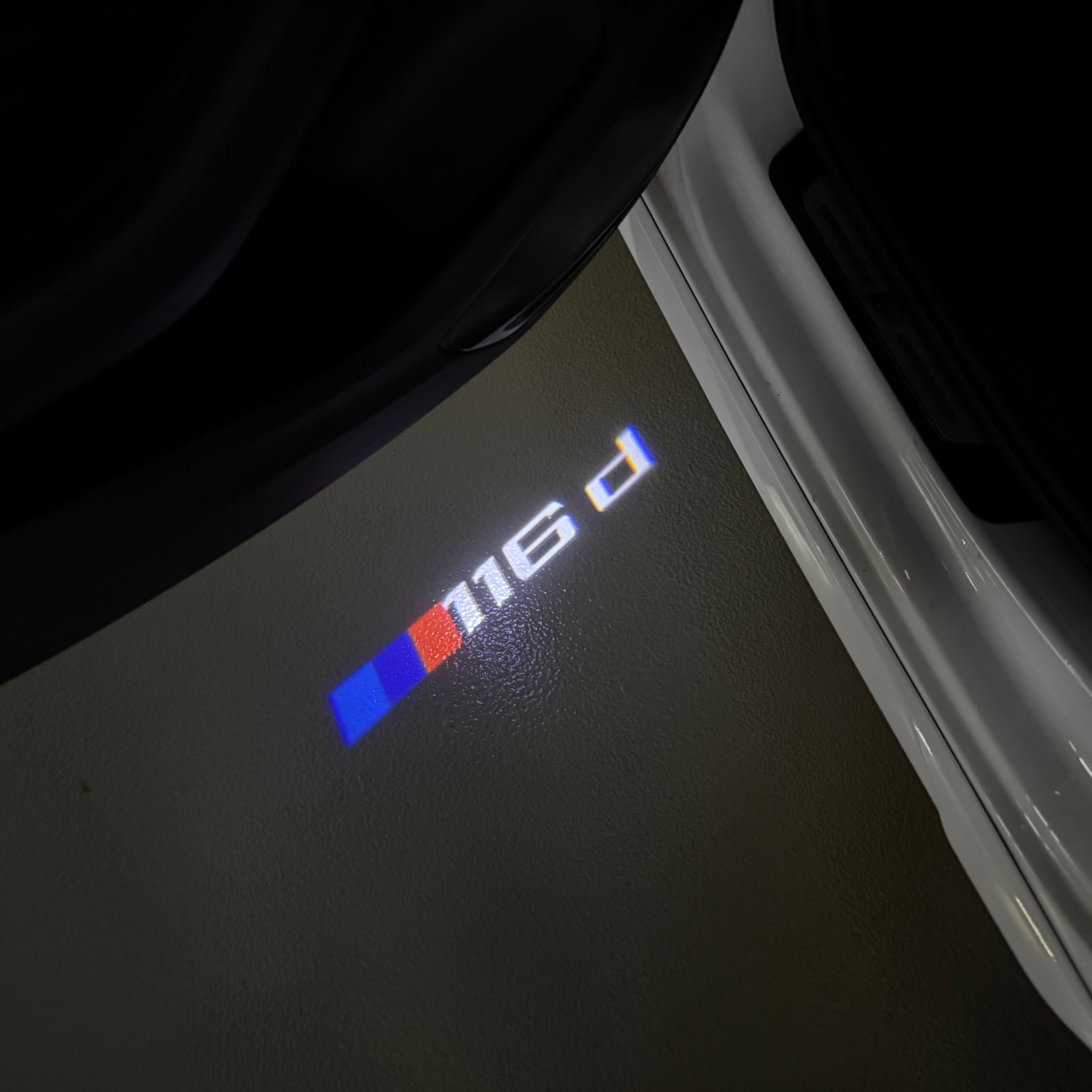 BMW  1 SERIES  116  LOGO PROJECTOT LIGHTS (quantity 1 = 1 sets/2 door lights) Nr.6024t17