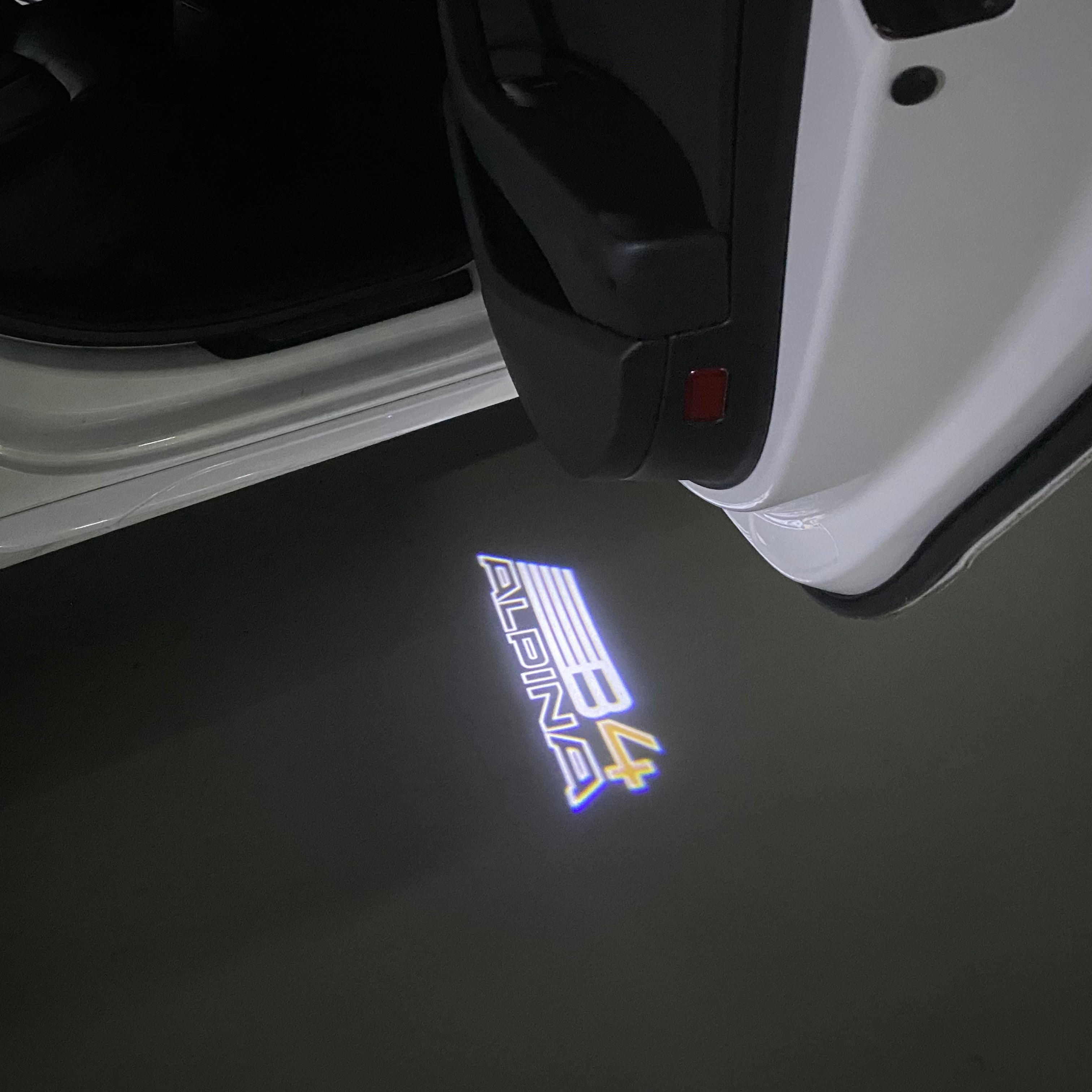 ALPINA B4 LOGO PROJECTOT LIGHTS  (quantity 1 = 1 sets/2 door lights) Nr.07A65