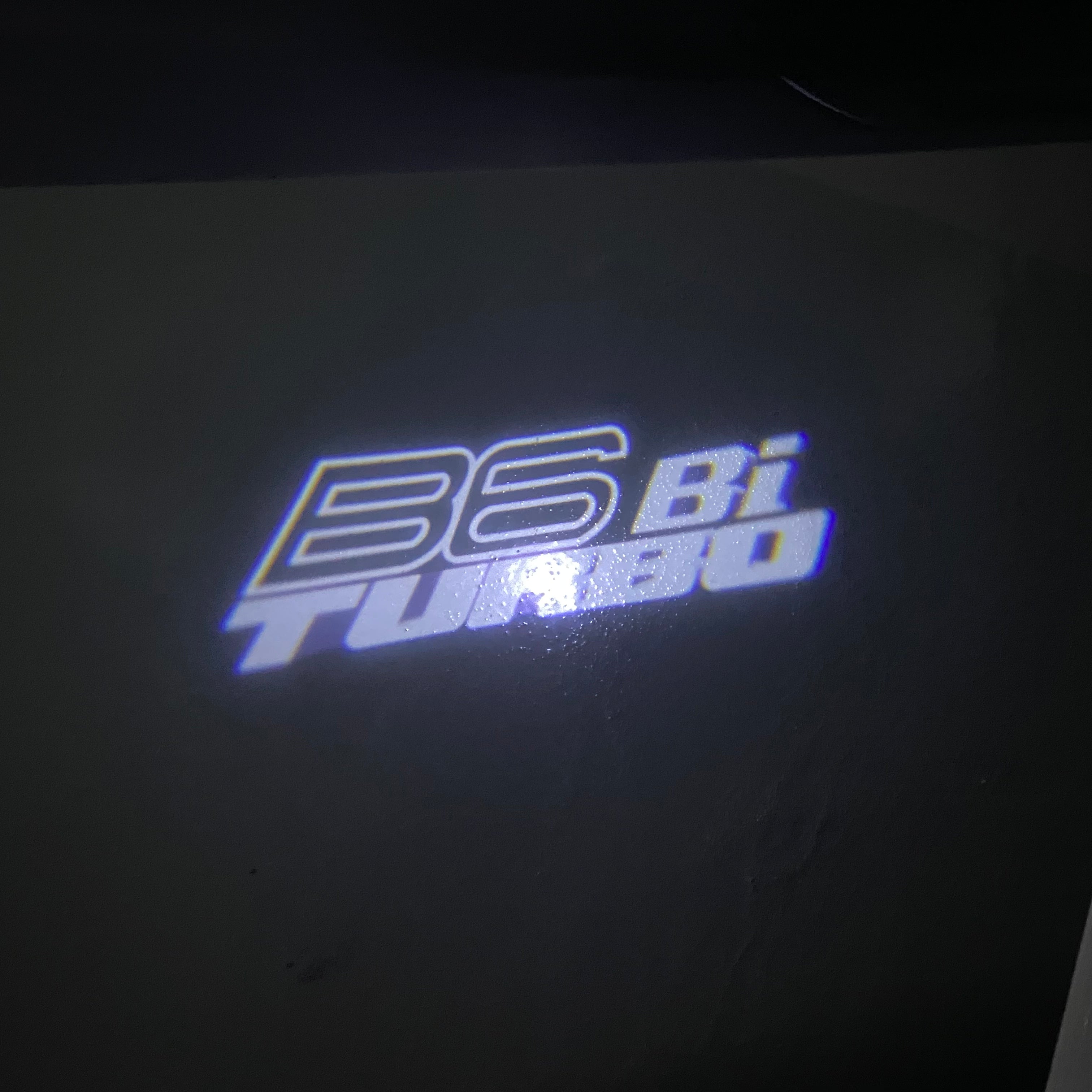 ALPINA B6 Bi TURBO   LOGO PROJECTOT LIGHTS  (quantity 1 = 1 sets/2 door lights) Nr.07A44