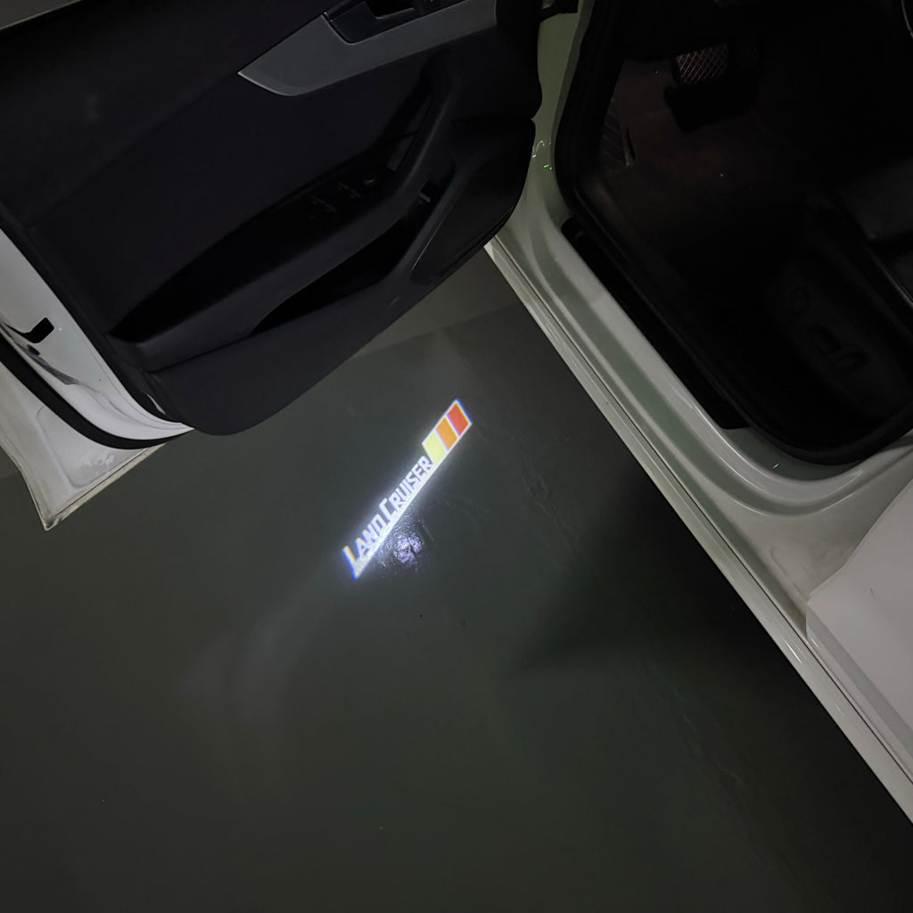 TOYOTA  LAND CRUISER   LOGO PROJECROTR LIGHTS  (quantity 1 = 1 sets/2 door lights) Nr.0G02