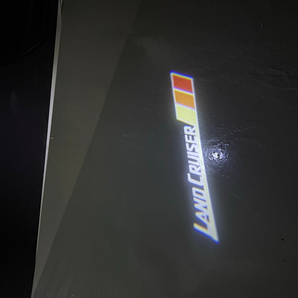 TOYOTA  LAND CRUISER   LOGO PROJECROTR LIGHTS  (quantity 1 = 1 sets/2 door lights) Nr.0G02