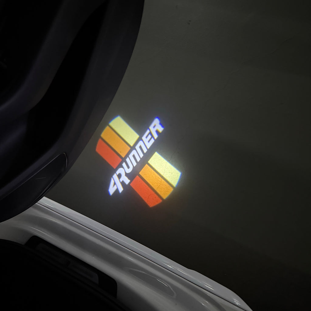 TOYOTA  ORIGINAL LOGO PROJECROTR LIGHTS  (quantity 1 = 1 sets/2 door lights) Nr.0G6H6