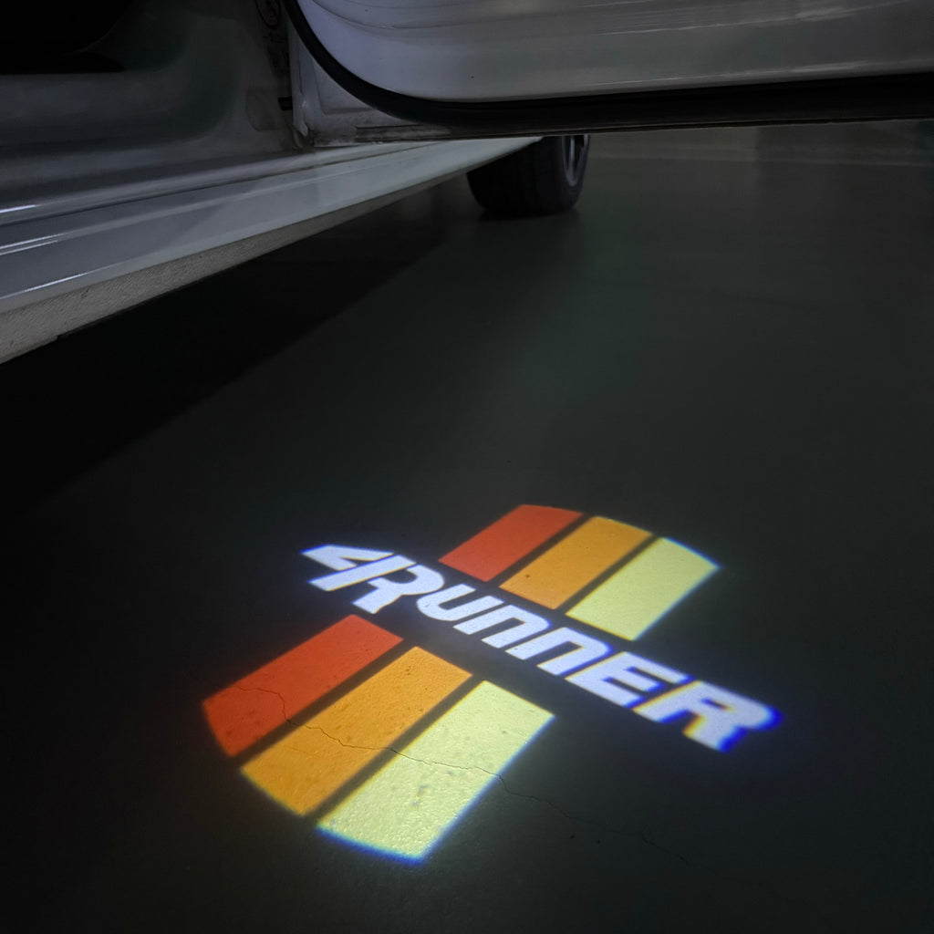 TOYOTA  ORIGINAL LOGO PROJECROTR LIGHTS  (quantity 1 = 1 sets/2 door lights) Nr.0G6H6