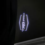 TRD LOGO PROJECROTR LIGHTS  (quantity 1 = 1 sets/2 door lights) Nr.0G48