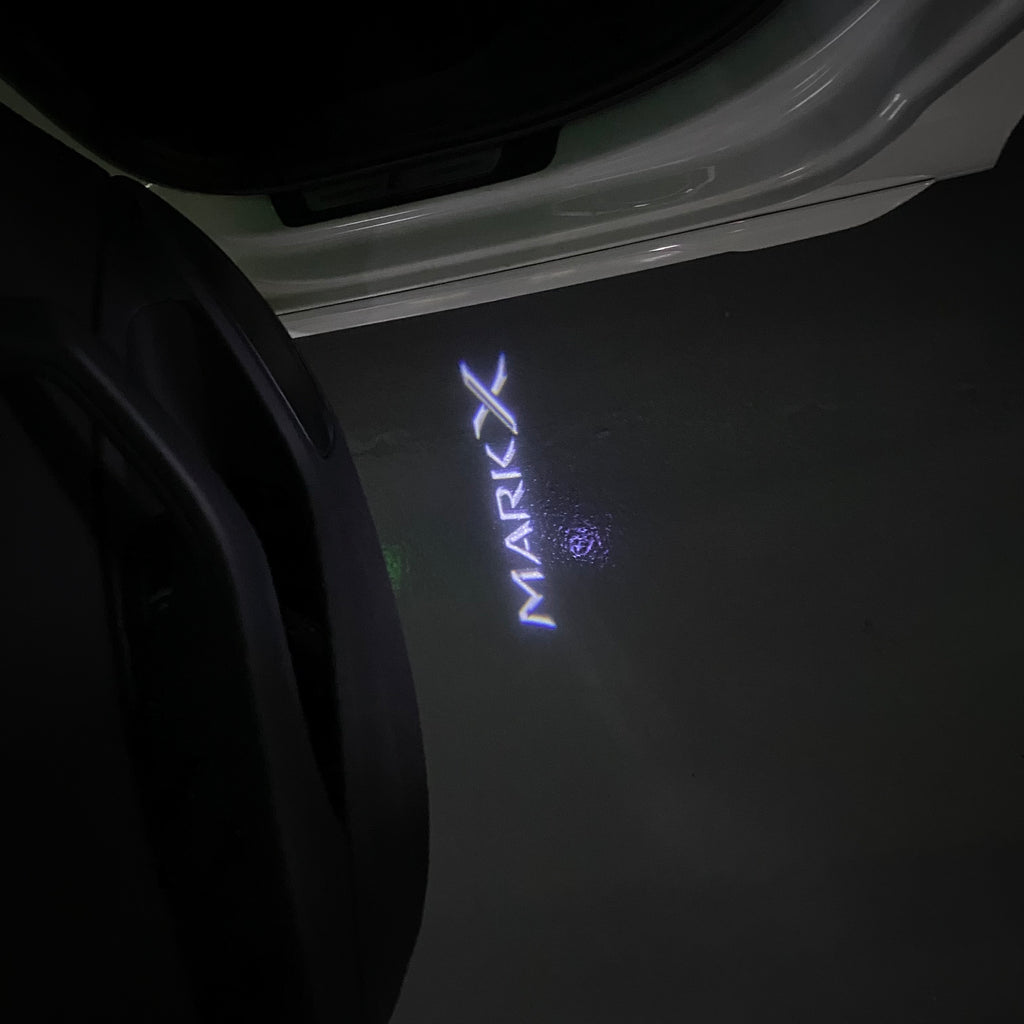 TOYOTA  MARK X LOGO PROJECROTR LIGHTS  (quantity 1 = 1 sets/2 door lights) Nr.0G07