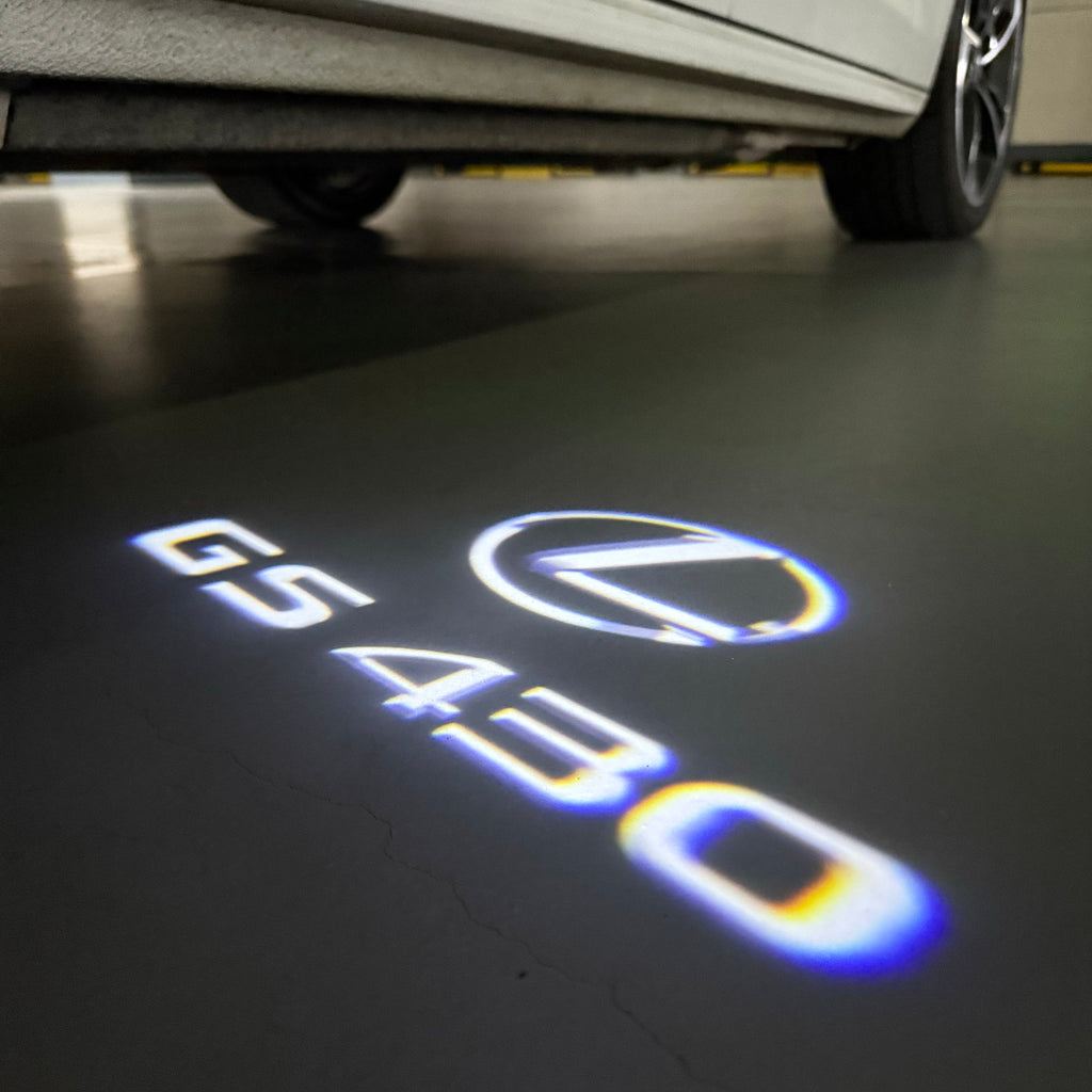 LEXUS LOGO PROJECTOR LIGHTS Nr.01 (الكمية 1 = 1 مجموعة / 2 أضواء باب)