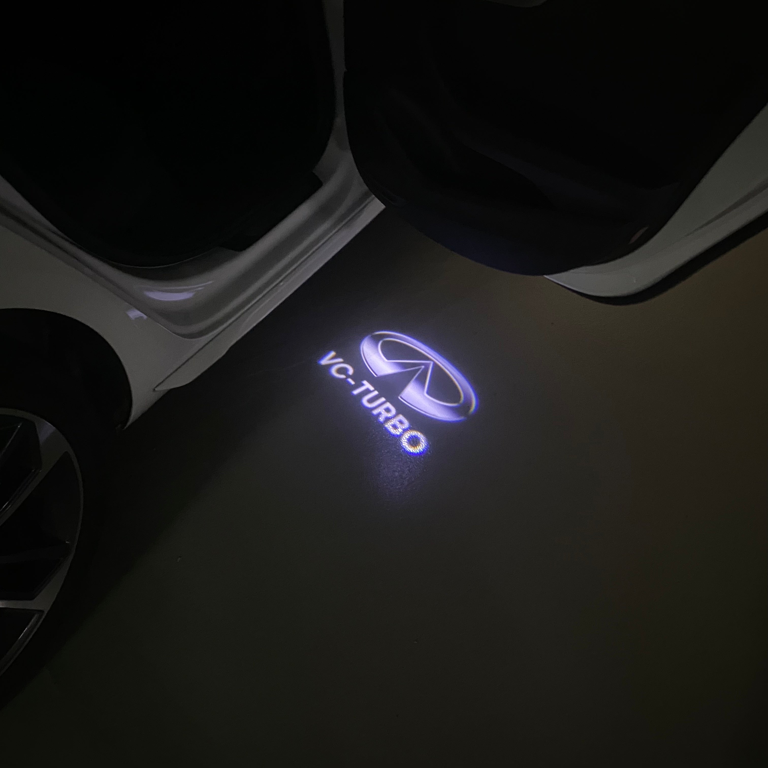 INFINITI VC-TURBO LOGO PROJECROTR LIGHTS Nr.93 (quantity 1 = 1 sets/2 door lights)