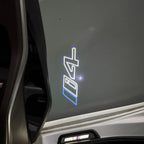BMW  i4  LOGO PROJECTOT LIGHTS (quantity 1 = 1 sets/2 door lights) Nr.6024q112
