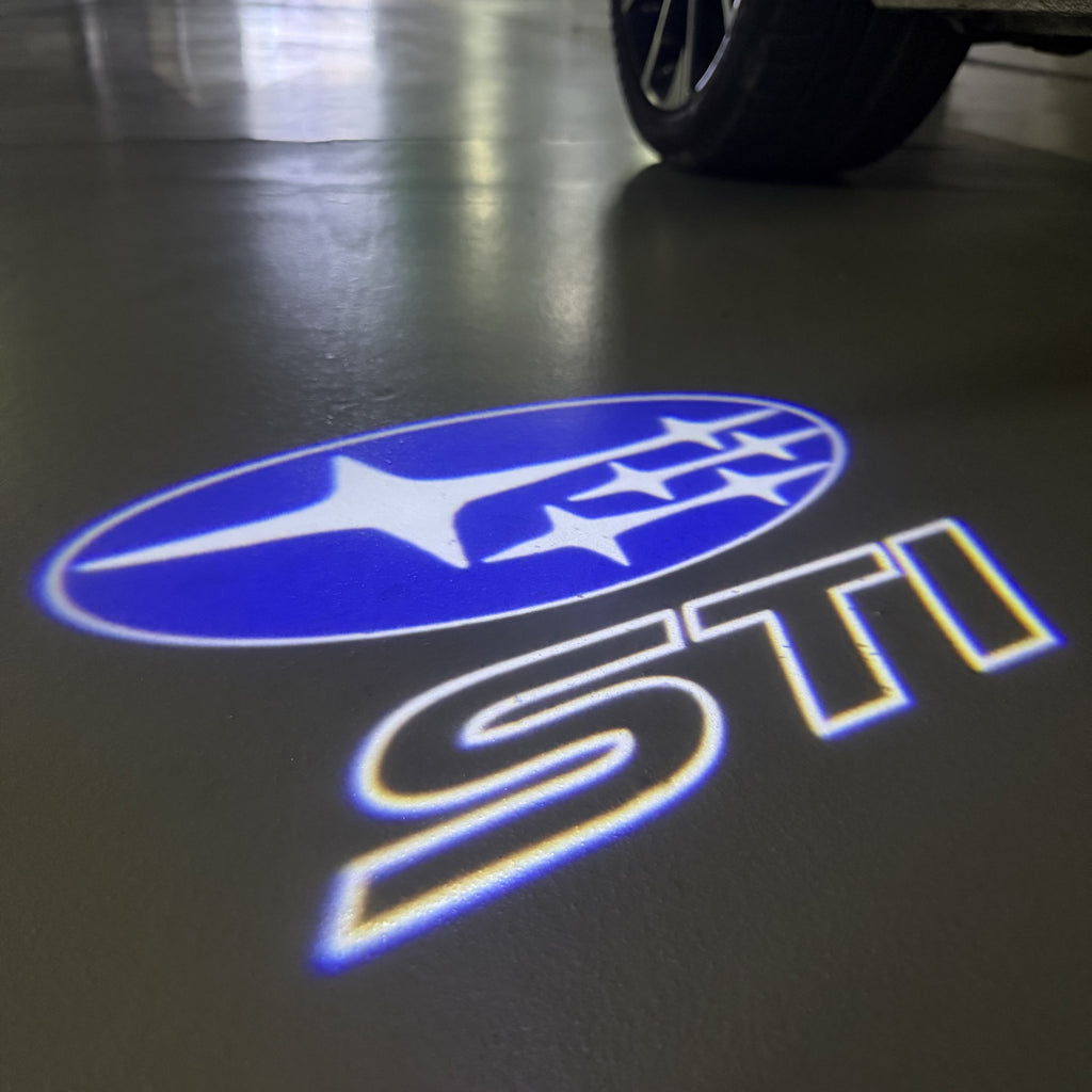 SUBARU IMPREZA STI LOGO PROJECROTR LIGHTS (quantity 1 = 1 sets/2 door lights) Nr.03A24