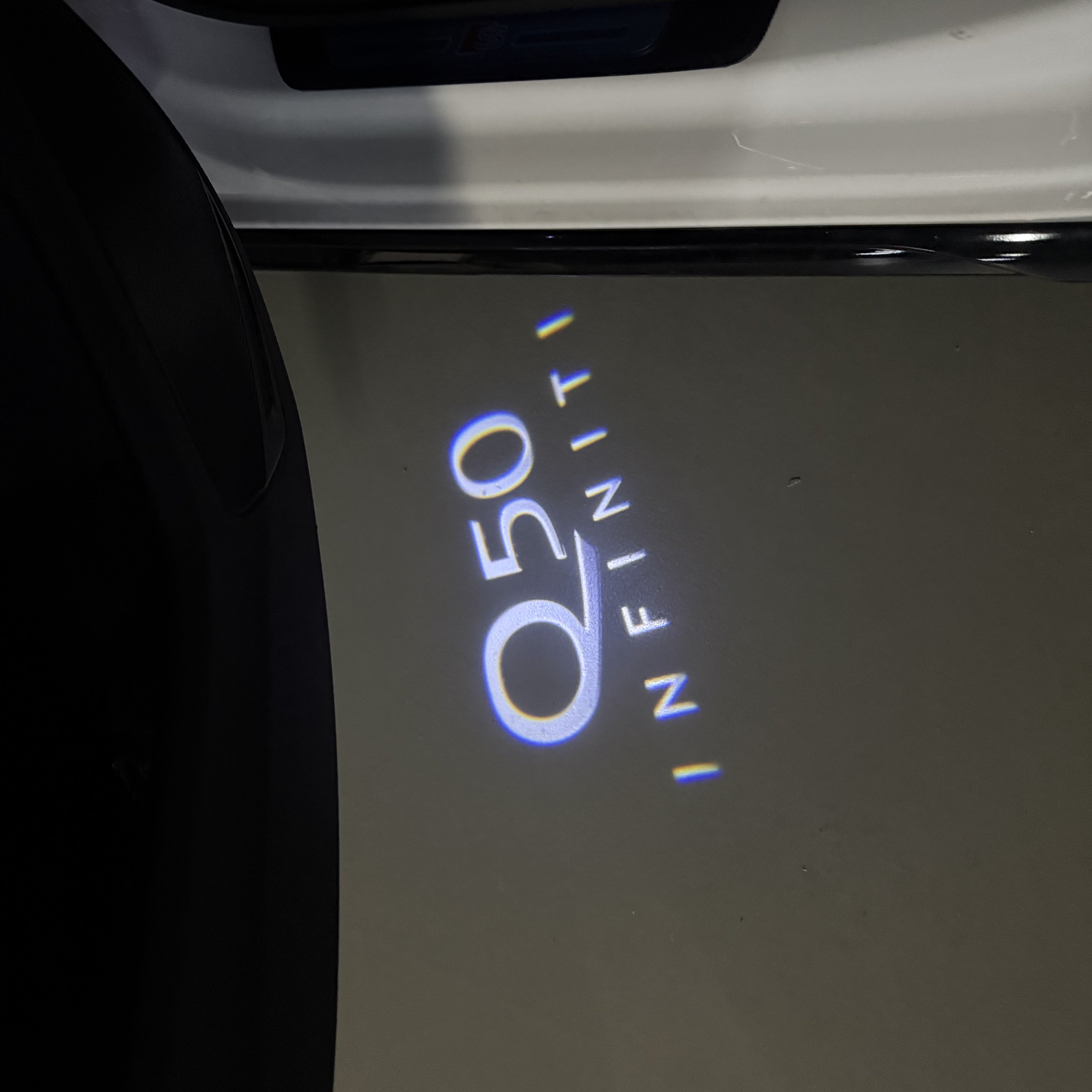 INFINITI  Q50 LOGO PROJECROTR LIGHTS  (quantity 1 = 1 sets/2 door lights)Nr.74A37