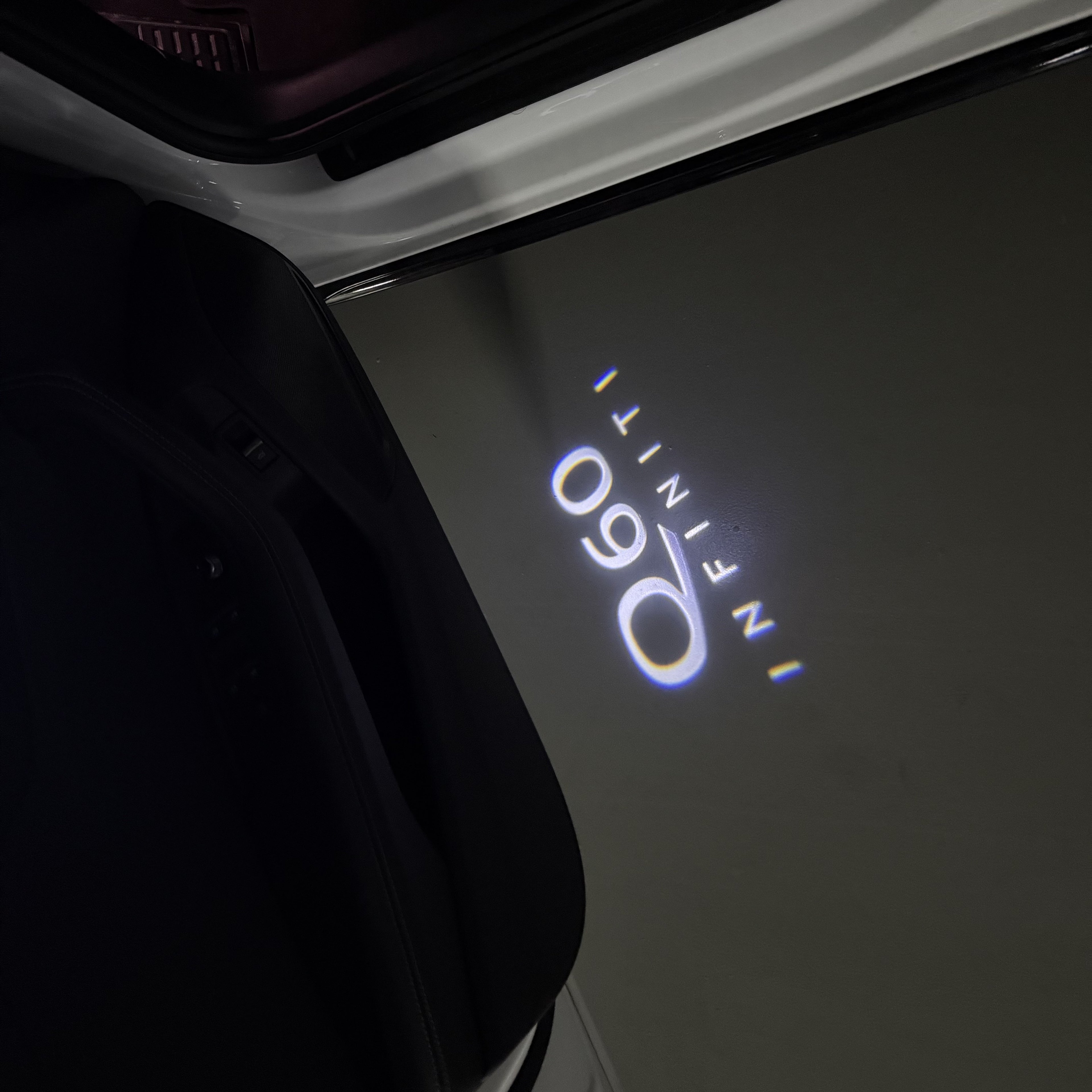 INFINITI  Q60 LOGO PROJECROTR LIGHTS  (quantity 1 = 1 sets/2 door lights)Nr.74A33