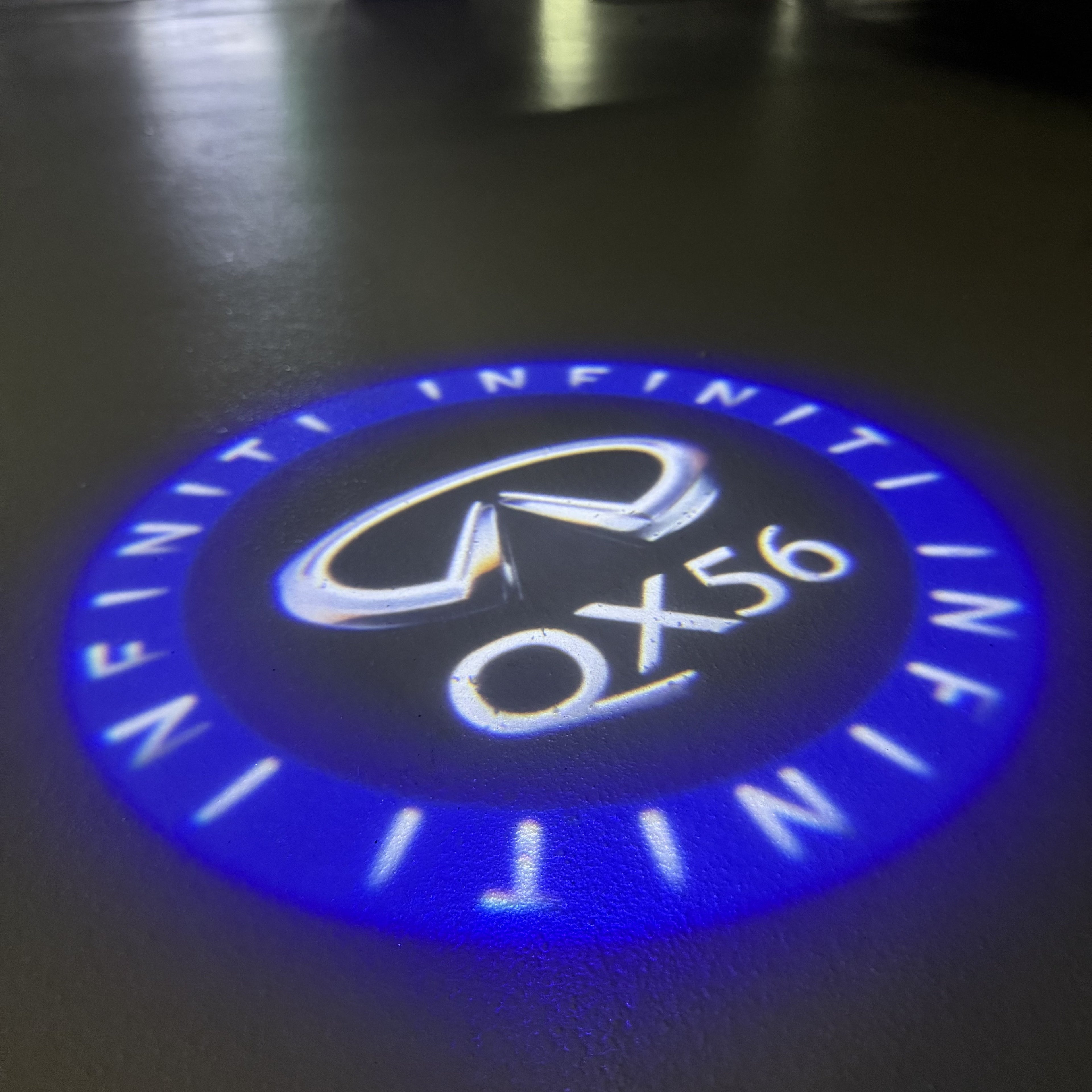 INFINITI  QX56 LOGO PROJECROTR LIGHTS  (quantity 1 = 1 sets/2 door lights)Nr.74A10