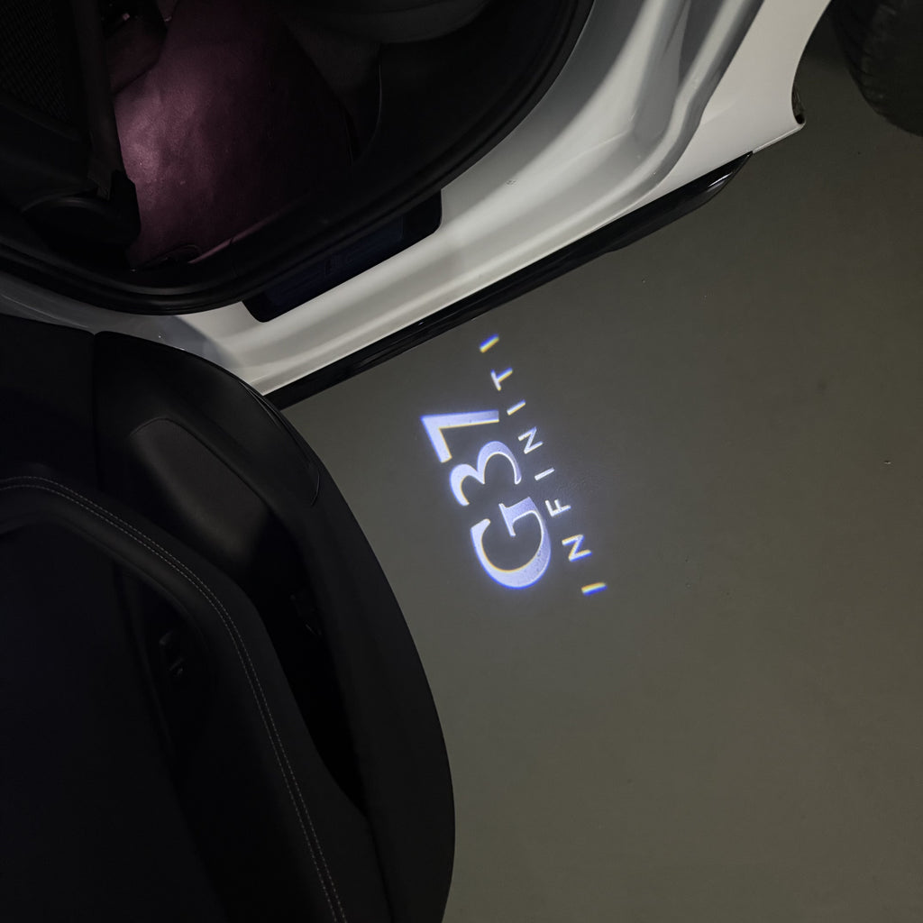 INFINTI QX56 LOGO PROJECROTR LIGHTS Nr.74 (cantidad 1 = 1 juego/2 luces de puerta)