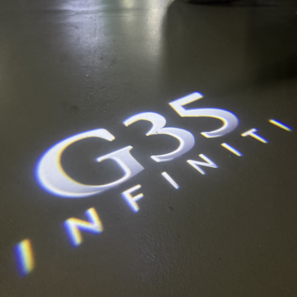 INFINTI QX56 LOGO PROJECROTR LIGHTS Nr.74 (cantidad 1 = 1 juego/2 luces de puerta)