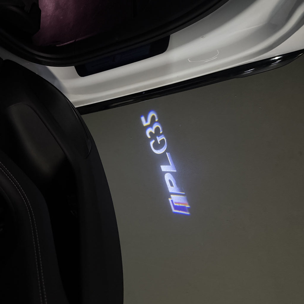 INFINTI QX56 LOGO PROJECROTR LIGHTS Nr.74 (cantidad 1 = 1 juego/2 luces de puerta)