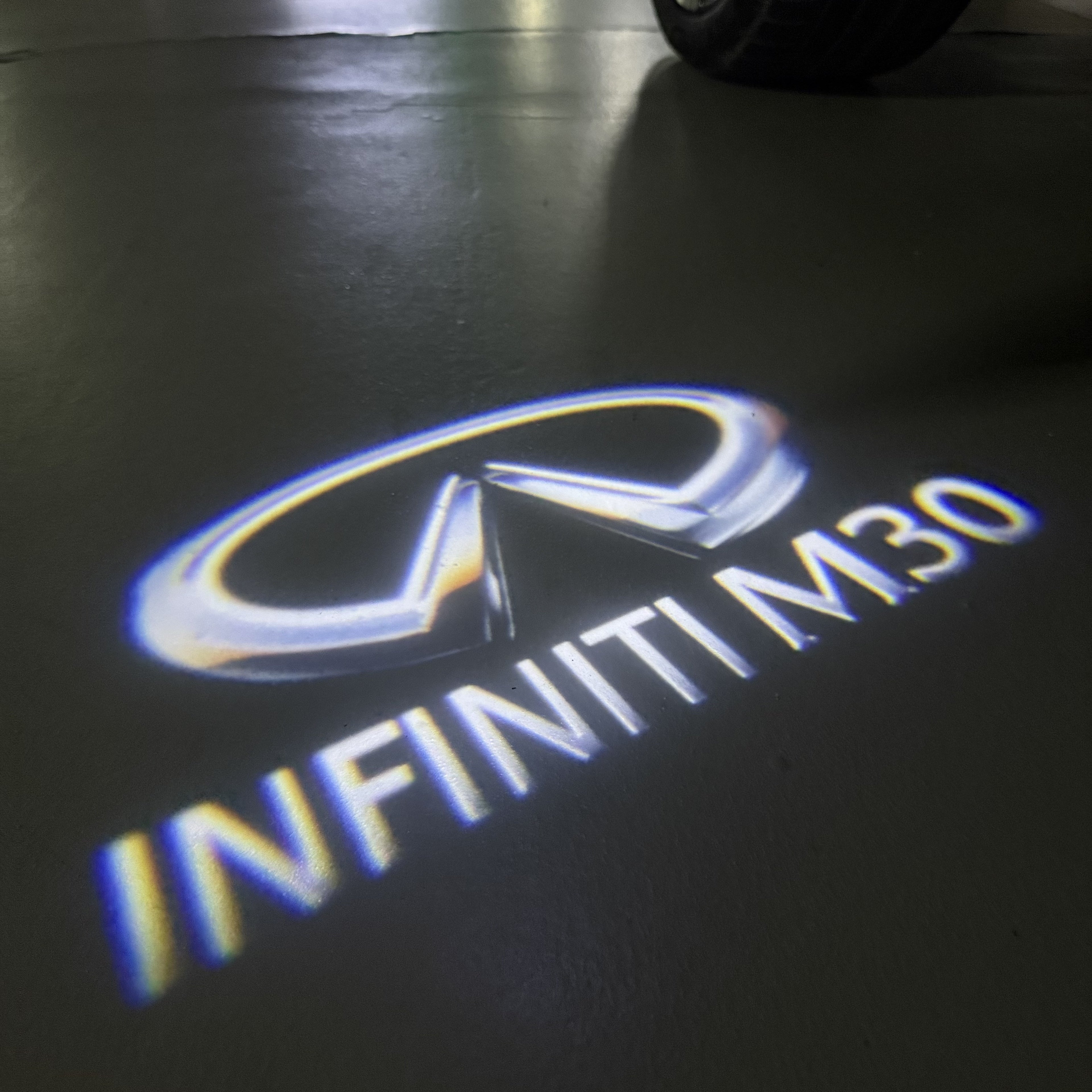 INFINITI   M30 LOGO PROJECROTR LIGHTS  (quantity 1 = 1 sets/2 door lights)Nr.74A98