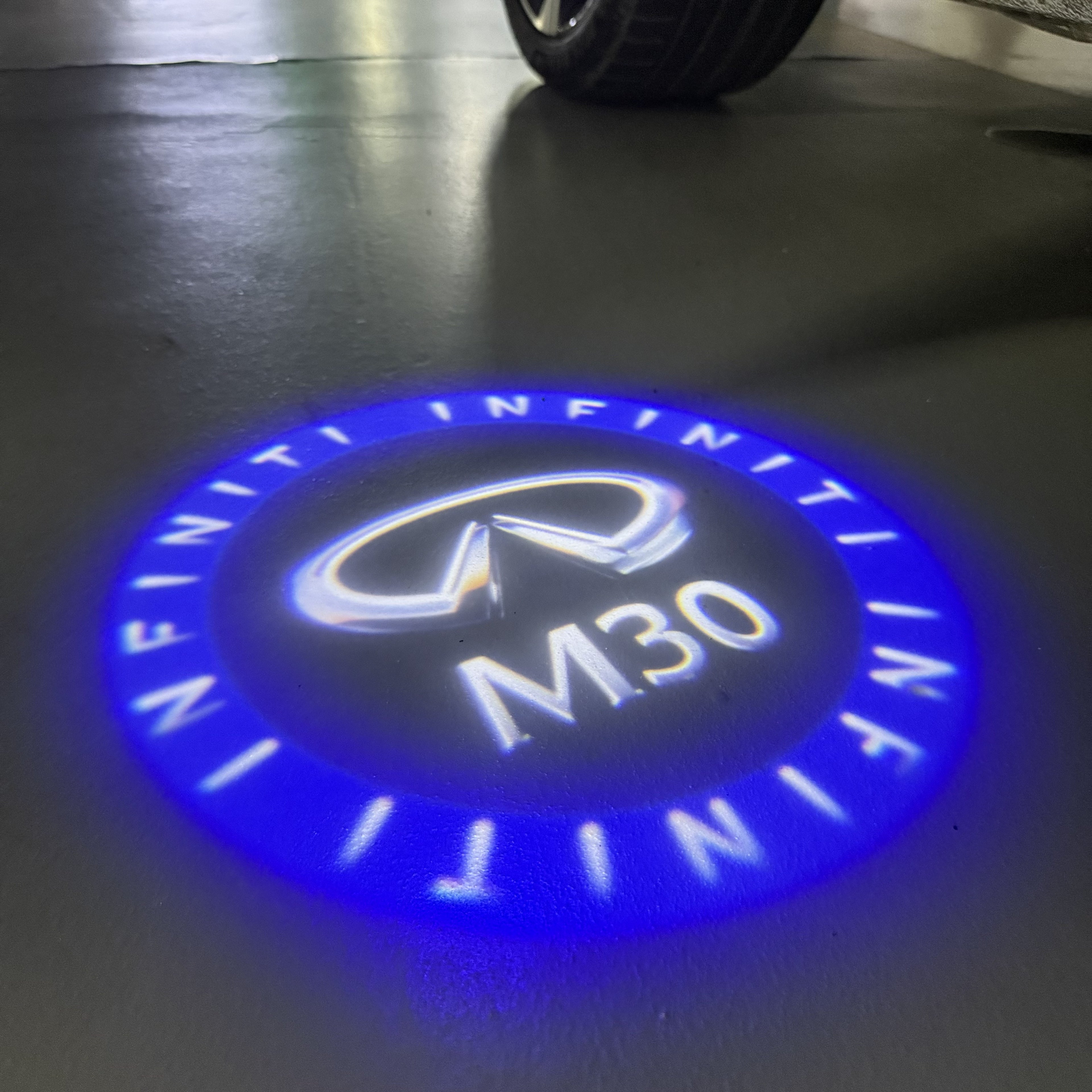 INFINITI  M30 LOGO PROJECROTR LIGHTS  (quantity 1 = 1 sets/2 door lights)Nr.74A96