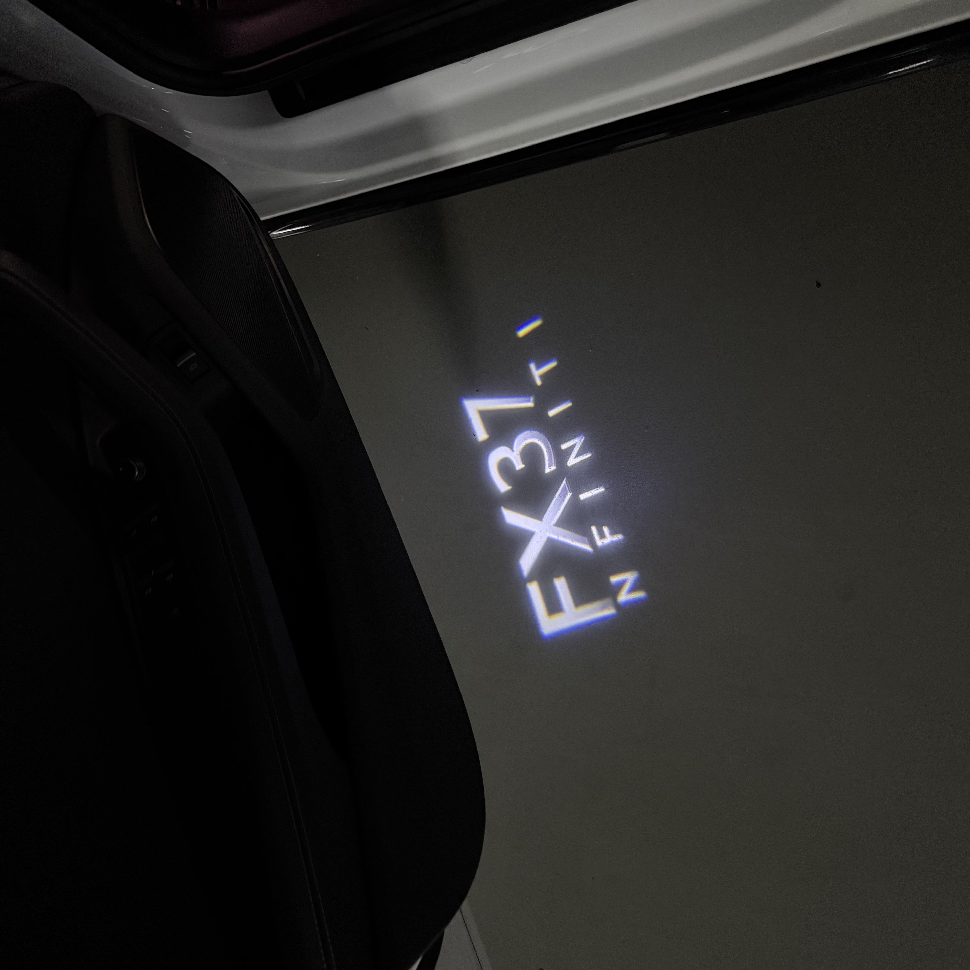 INFINITI  FX37 LOGO PROJECROTR LIGHTS  (quantity 1 = 1 sets/2 door lights)Nr.74A72