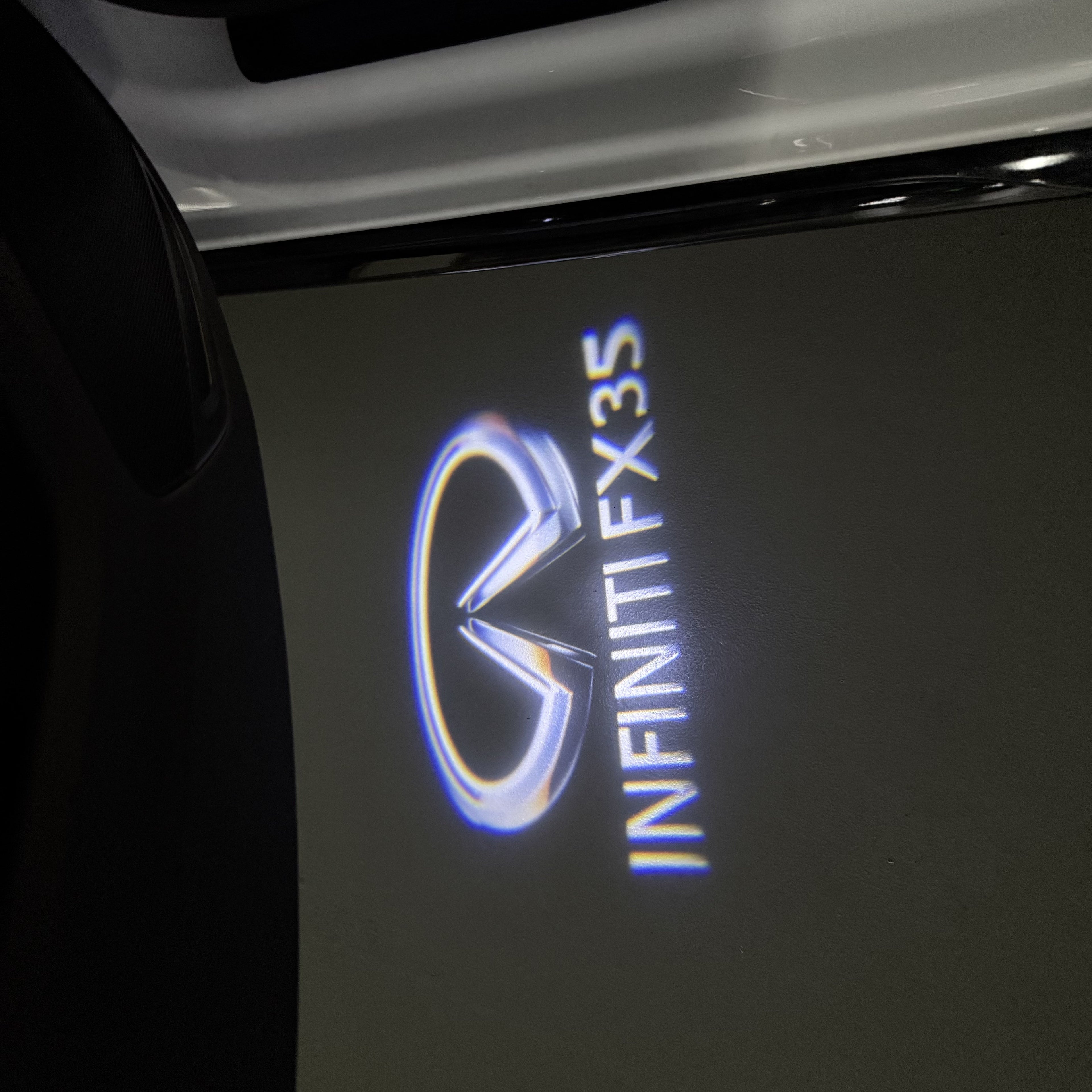 INFINITI  FX35 LOGO PROJECROTR LIGHTS  (quantity 1 = 1 sets/2 door lights)Nr.74A70