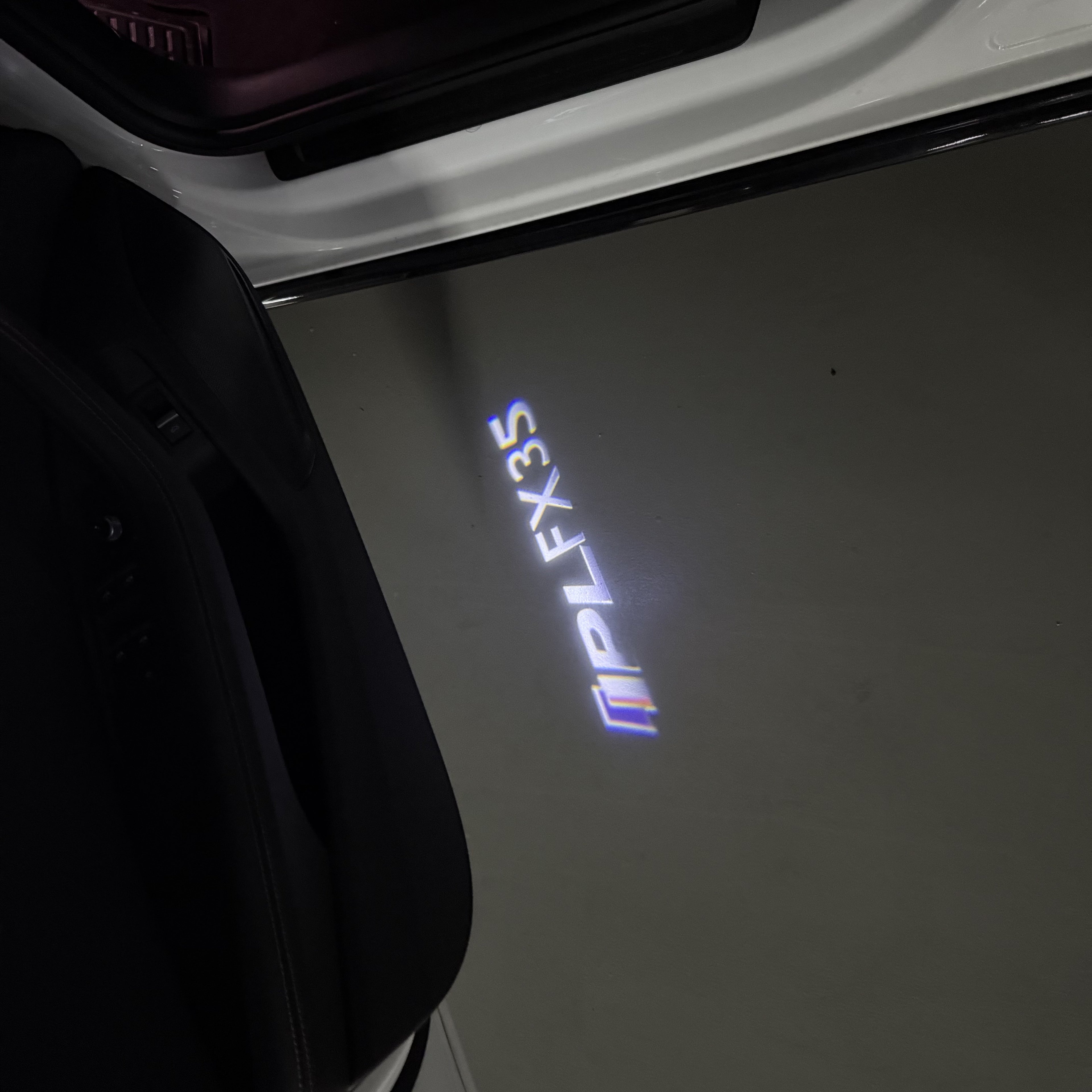 INFINITI  FX35 LOGO PROJECROTR LIGHTS  (quantity 1 = 1 sets/2 door lights)Nr.74A66