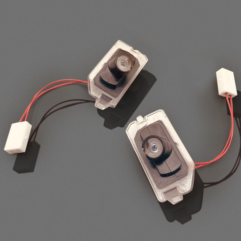 VW UMFELDBELEUCHTUNG MIT PROJEKTION DES MARKEN LOGOS