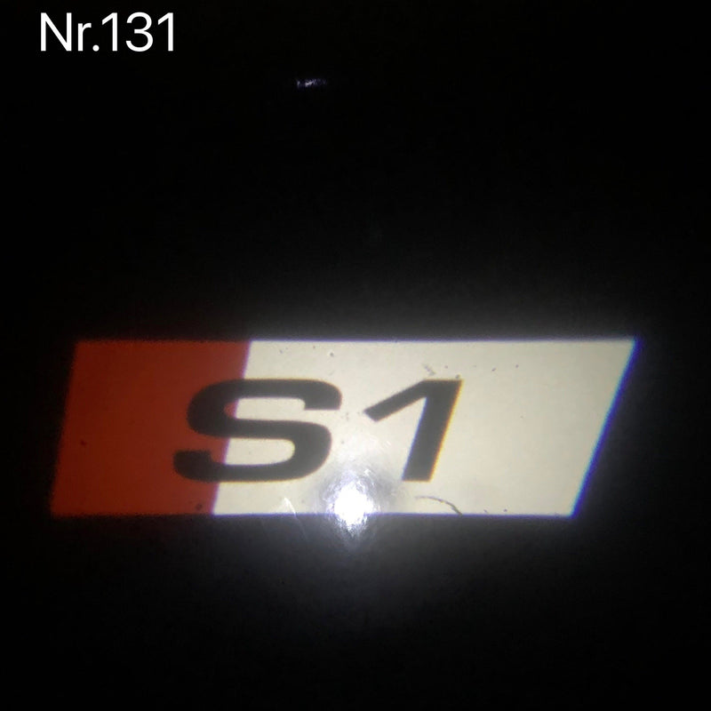 AUDI S1  LOGO PROJECTOT LIGHTS Nr.127  (quantity 1 = 2 Logo Films /2 door lights）