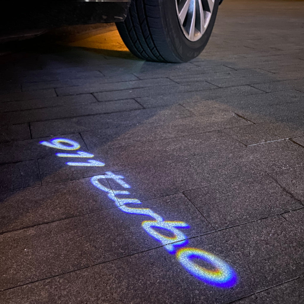 PORSCHE LOGO PROJECTOT LIGHTS Nr.49 (cantidad 1 = 2 logo película / 2 luces de puerta)