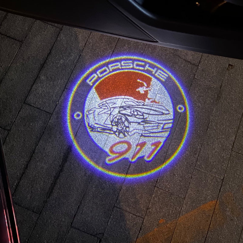 PORSCHE  911  LOGO PROJECTOT LIGHTS Nr.47 (quantity  1 =  2 Logo Film /  2 door lights)