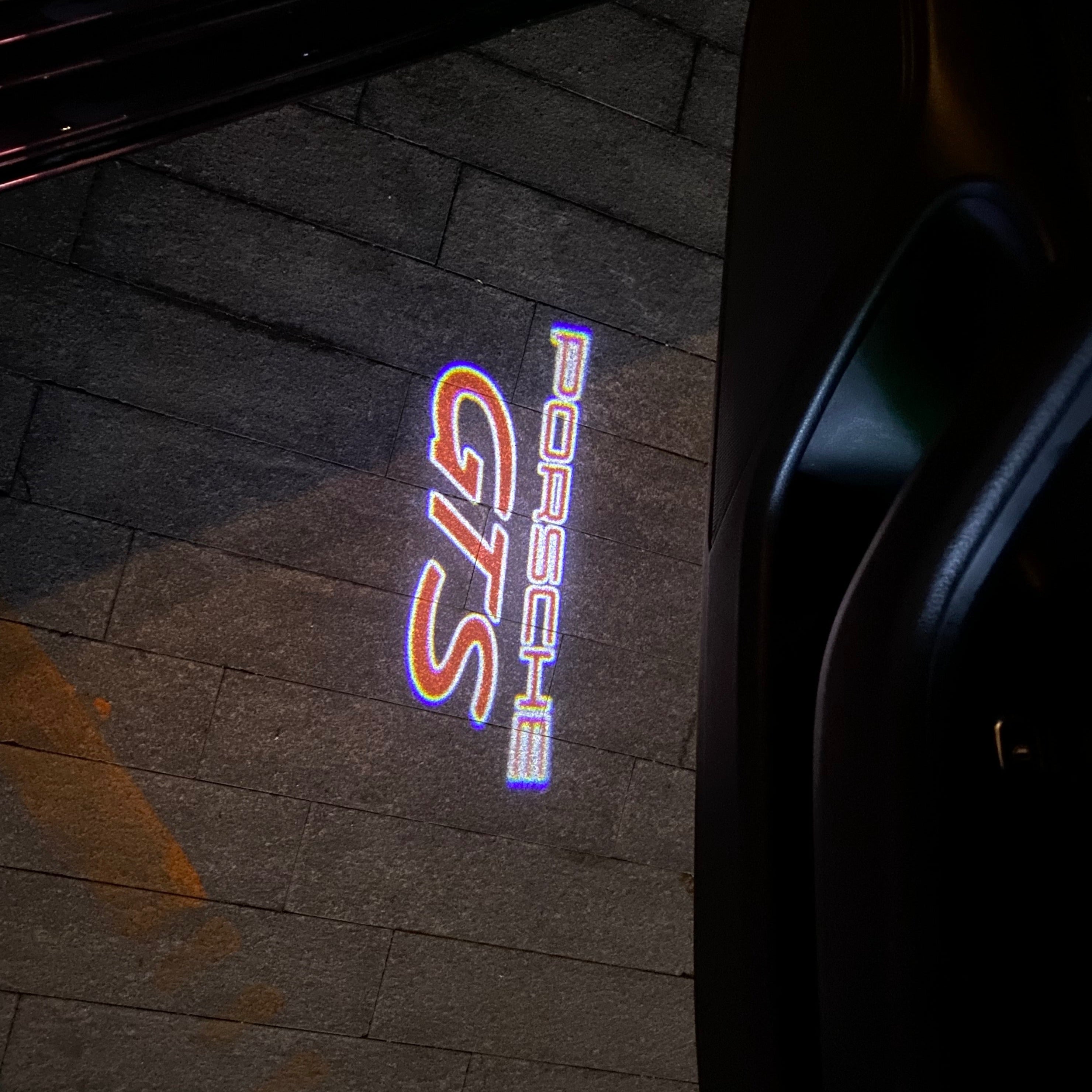 LUCES DE PROYECTOR DE LOGOTIPO ORIGINAL PORSCHE N ° 03 (cantidad 1 = 2 Película de logotipo / 2 luces de puerta)