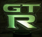LUCES DE PROYECTOR DE LOGOTIPO GTR-R35 N ° 07 (cantidad 1 = 2 películas con logotipo / 2 luces de puerta)