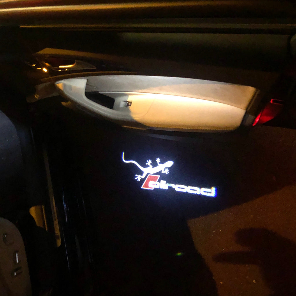 AUDI ALLROAD GECKO LOGO PROJEKTORLEUCHTEN Nr.147 (Anzahl 1 = 2 Logo Folien & 2 Türleuchten)