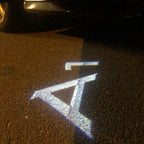 LUCI PROIETTORI LOGO AUDI Nr.169 (quantità 1 = 2 Pellicole Logo / 2 luci porta)