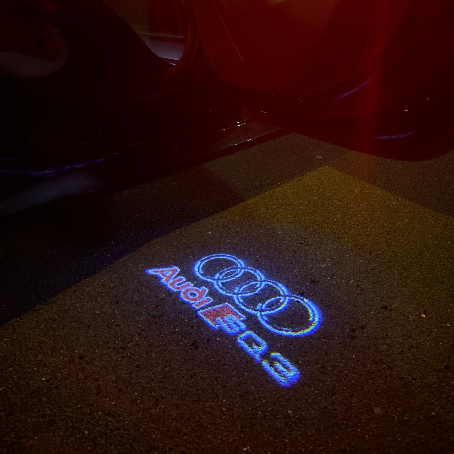 AUDI LOGO PROJECTOT LIGHTS Nr.254 (الكمية 1 = 2 Logo Films /2 أضواء الباب)