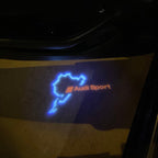 أضواء جهاز عرض شعار AUDI رقم 31 (الكمية 1 = 2 فيلم شعار / 2 مصباح باب)