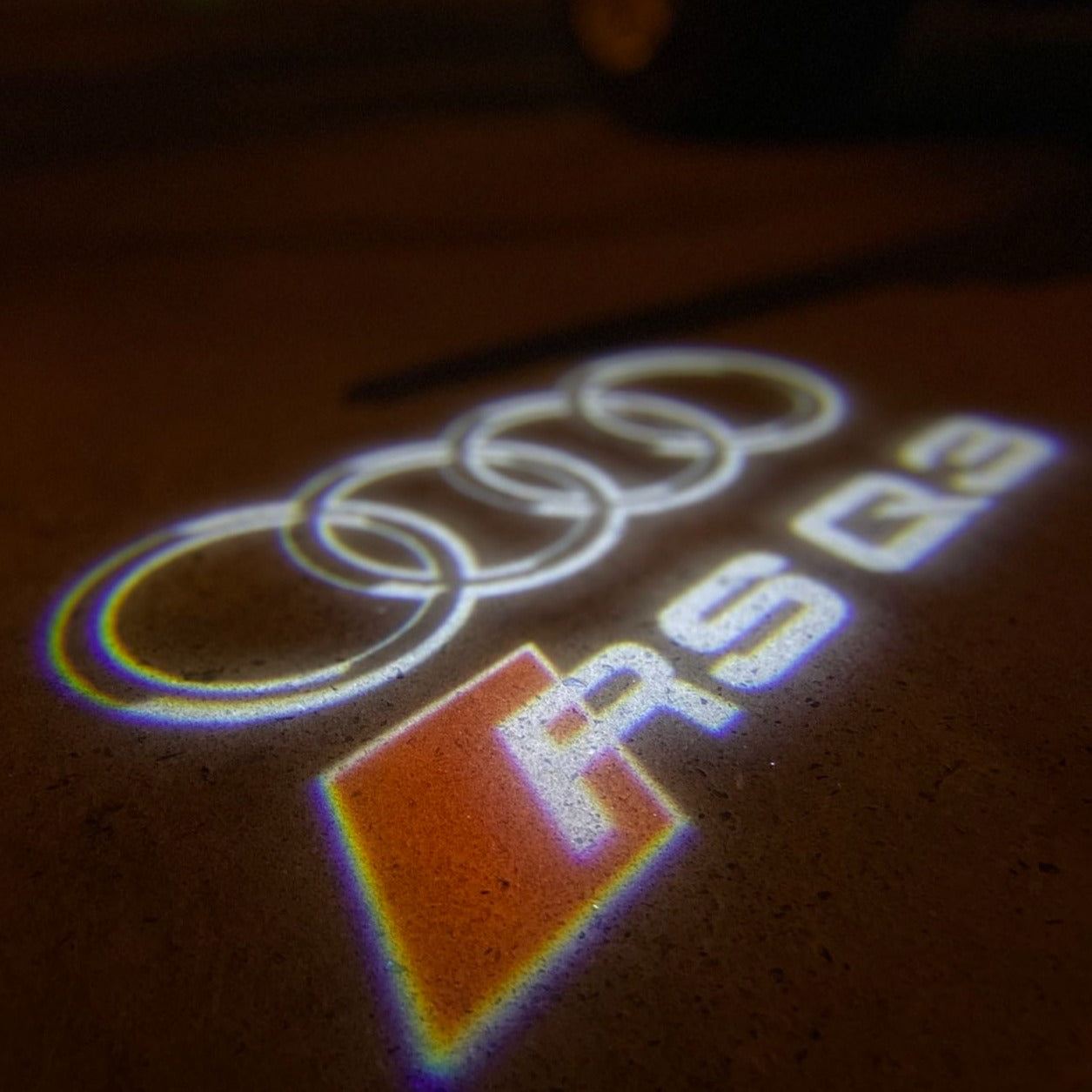 AUDI LOGO PROJECTOT LIGHTS Nr.19 (cantidad 1 = 2 películas con logotipo /2 luces de puerta)