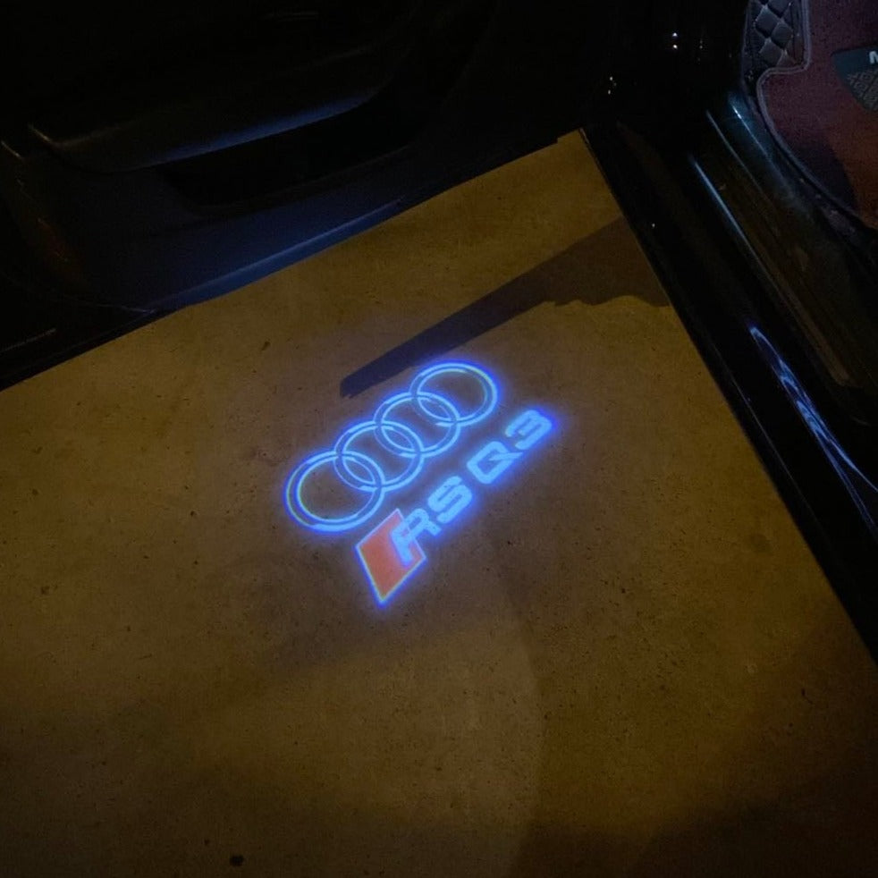 AUDI LOGO PROJECTOT LIGHTS Nr.19 (cantidad 1 = 2 películas con logotipo /2 luces de puerta)
