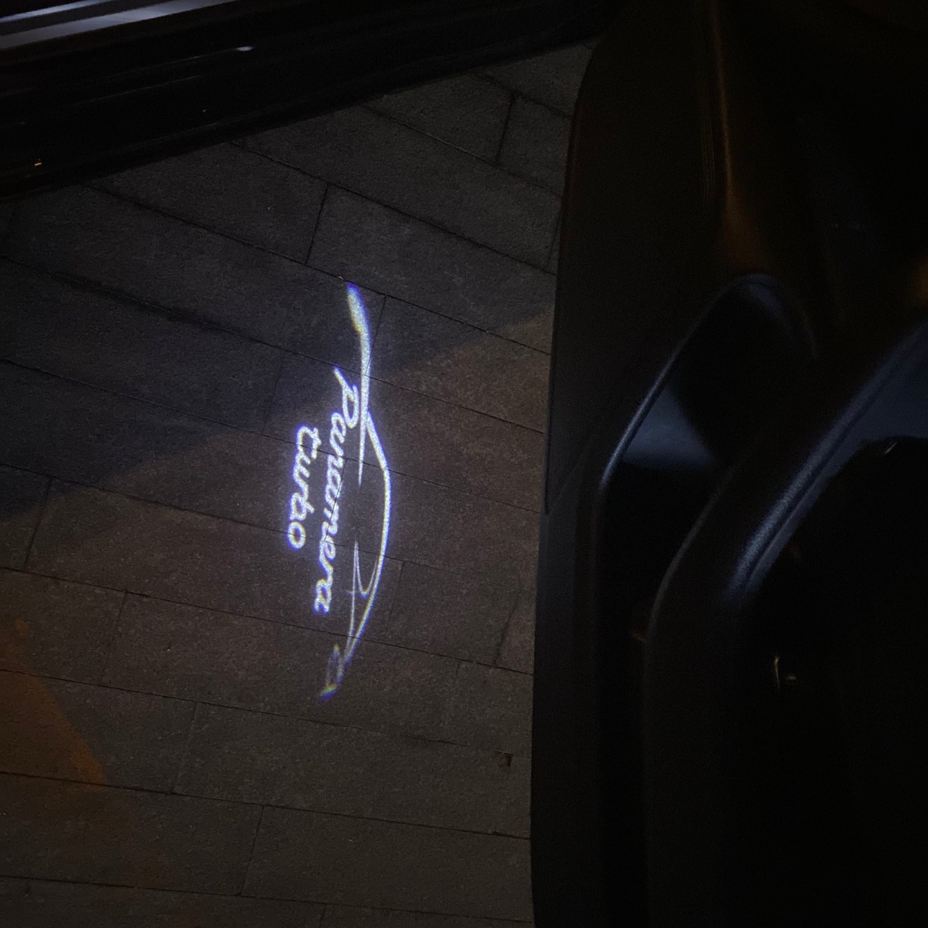 PORSCHE LOGO PROJECTOT LIGHTS Nr.84 (cantidad 1 = 2 logo película / 2 luces de puerta)