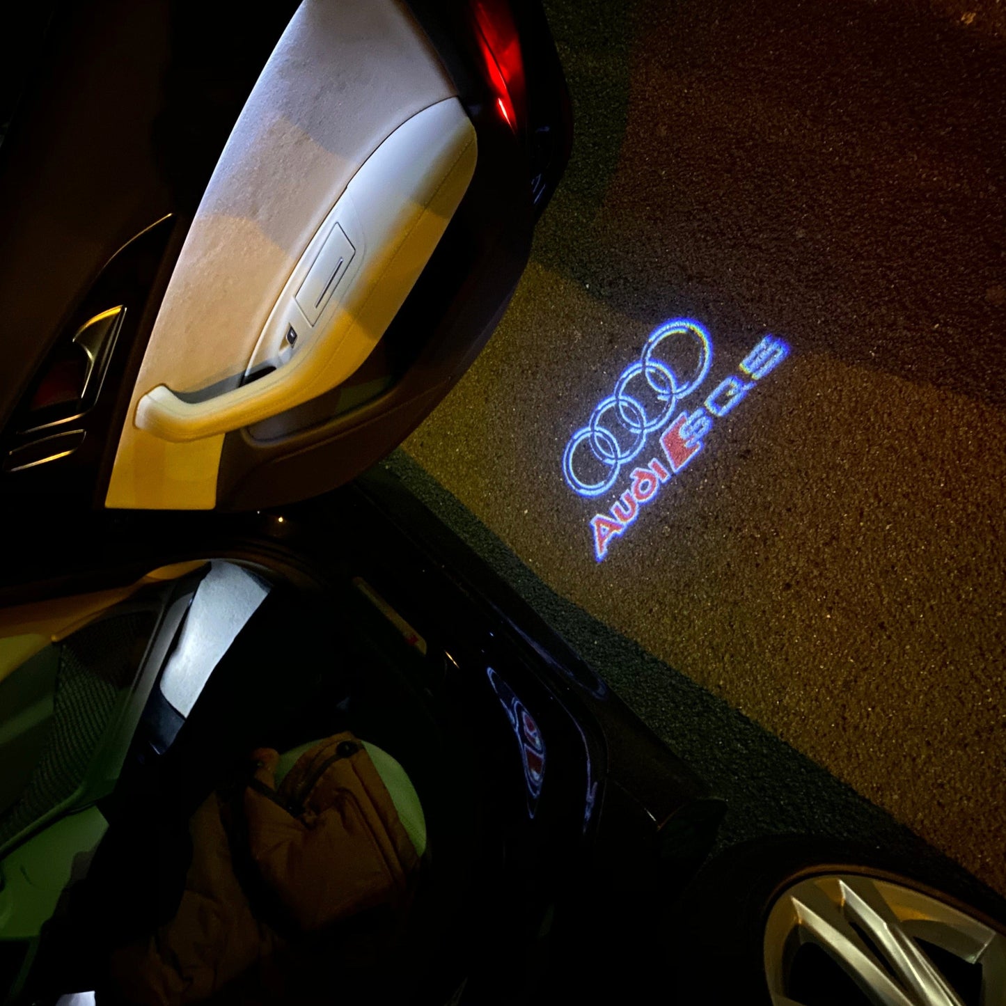 AUDI LOGO PROJECTOT LIGHTS Nr.253 (الكمية 1 = 2 Logo Films /2 أضواء الباب)