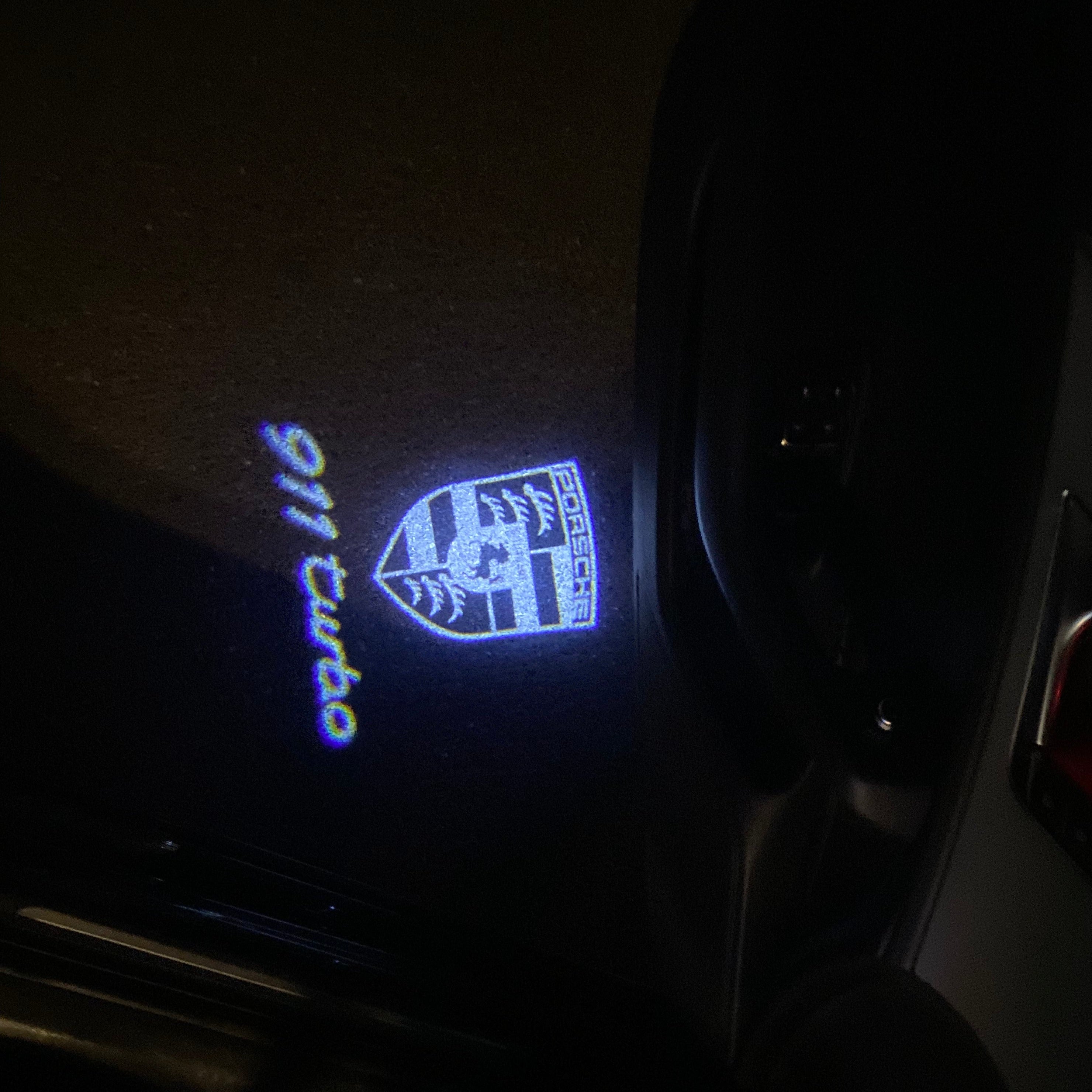 PORSCHE LOGO PROJECTOT LIGHTS Nr.81 (cantidad 1 = 2 logo película / 2 luces de puerta)