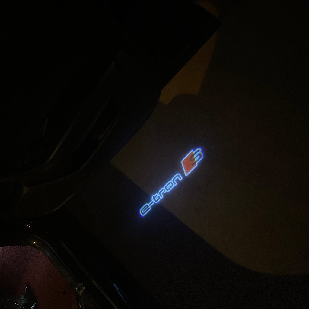 AUDI LOGO PROJECTOT LIGHTS Nr.19 (الكمية 1 = 2 Logo Films /2 أضواء الباب)