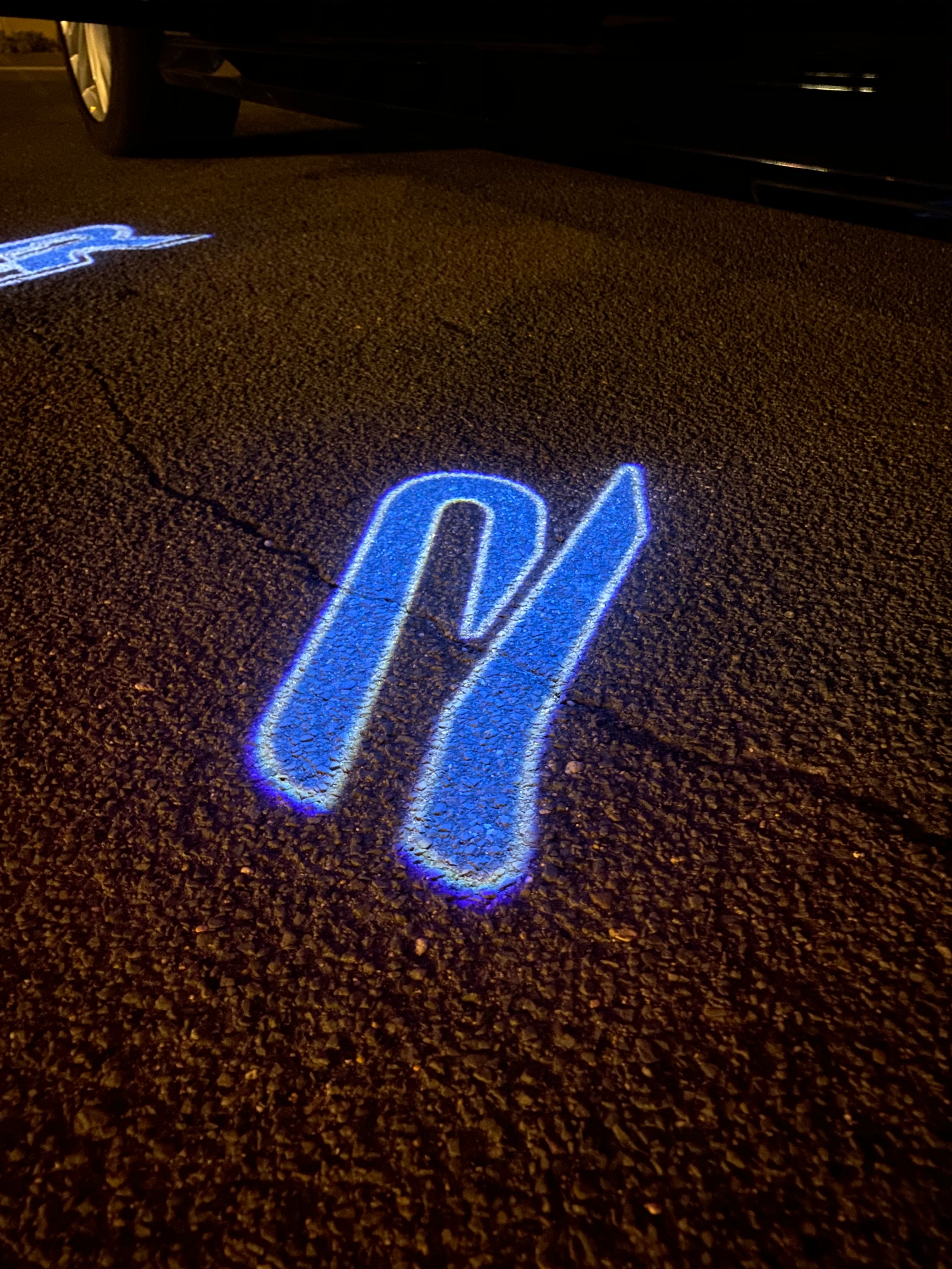 Volkswagen Door lights R Logo Nr. 153 ( quantité 1 = 2 logo film / 2 feux de porte)