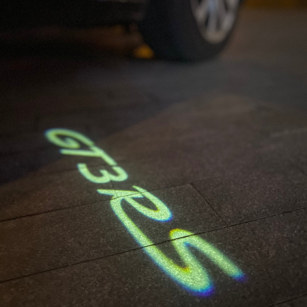 LUCES DE PROYECTOR DE LOGOTIPO ORIGINAL PORSCHE N ° 03 (cantidad 1 = 2 Película de logotipo / 2 luces de puerta)