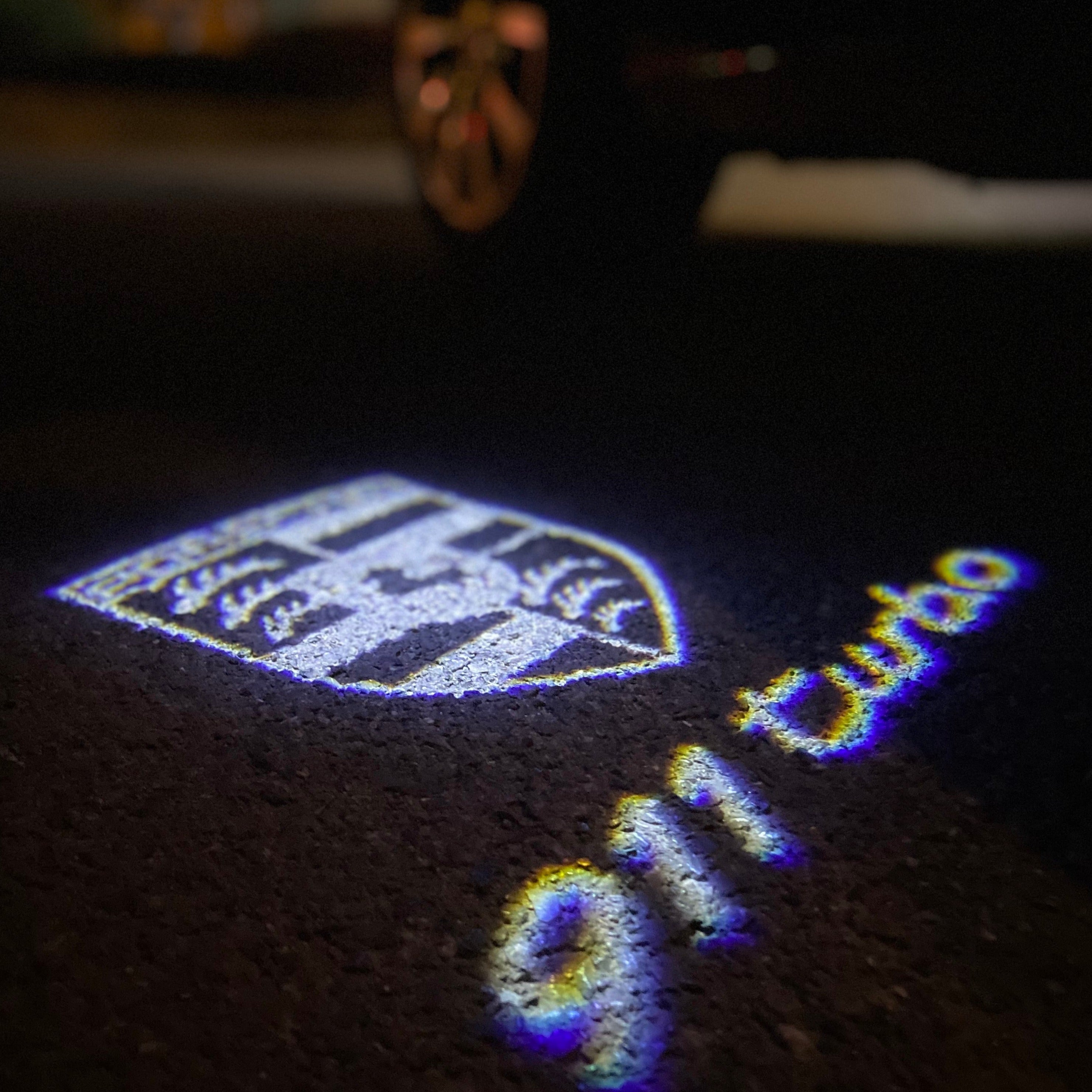 PORSCHE LOGO PROJECTOT LIGHTS Nr.81 (cantidad 1 = 2 logo película / 2 luces de puerta)