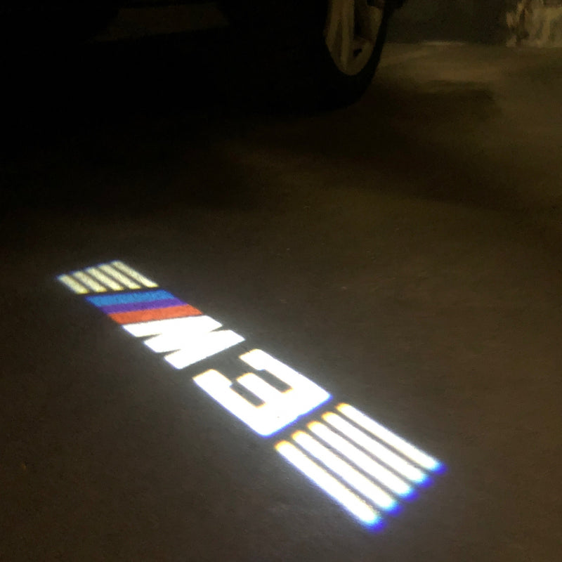 ÉCLAIRAGE DE PROJECTEUR BMW M3 LOGO Nr.24 (quantité 1 = 1 jeux / 2 feux de porte)