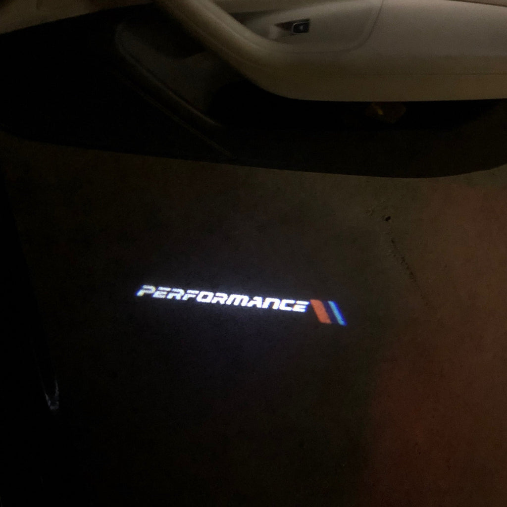 LUCI PROIETTORI CON LOGO BMW Nr.15 (quantità 1 = 1 set / 2 luci porta)