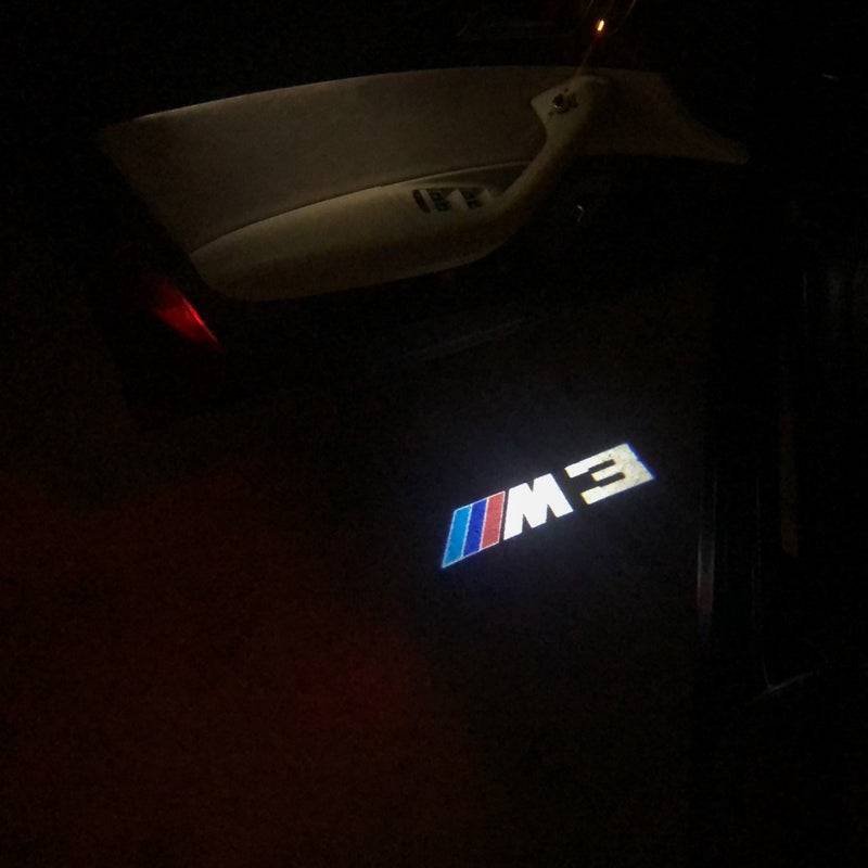 BMW M3 LOGO PROJECTOR LIGHTS Nr.25 (الكمية 1 = 1 مجموعة / 2 أضواء باب)
