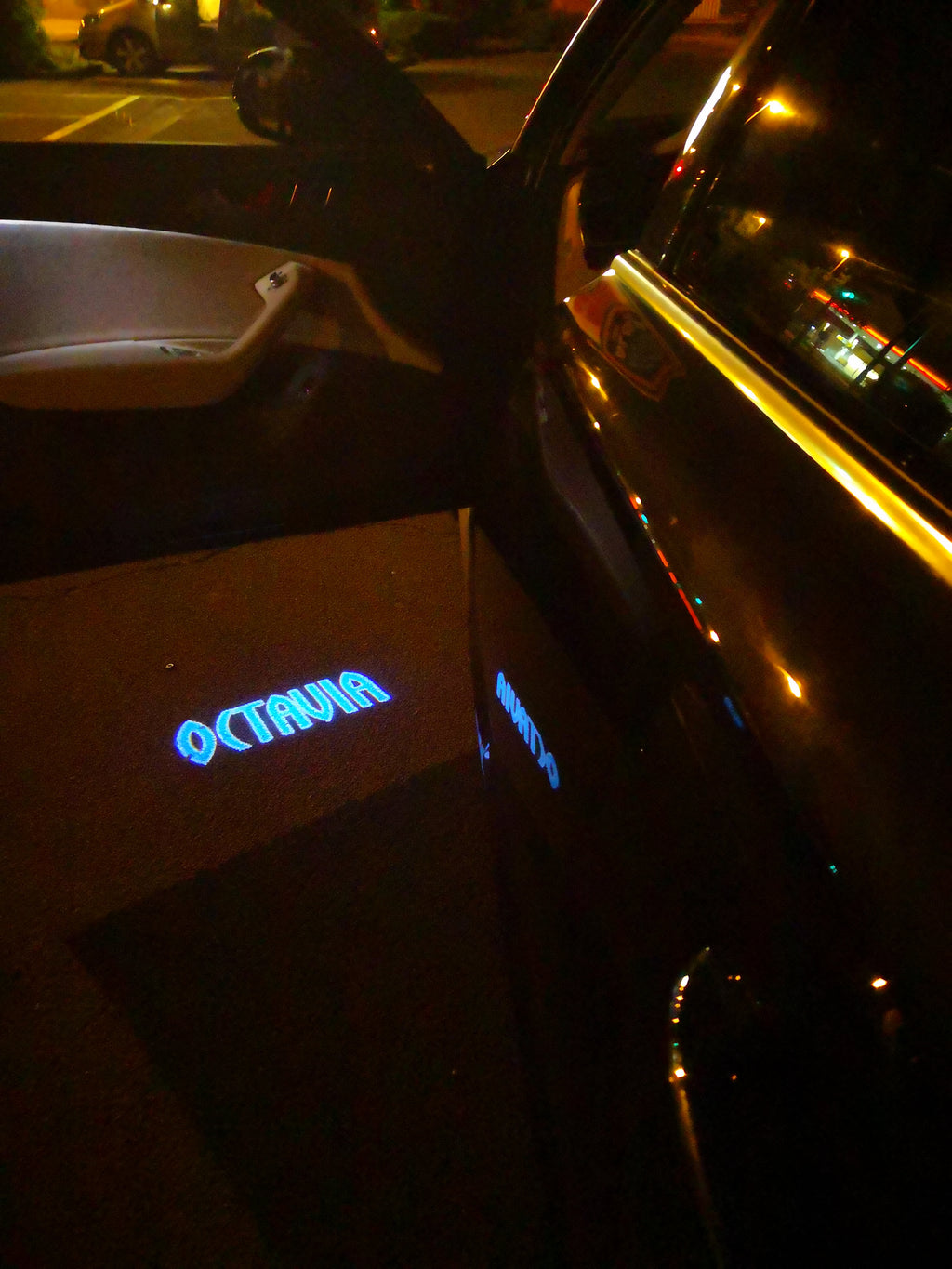 SKODA OCTAVIA LOGO PROJECTOT LIGHTS Nr.103 (quantity  1 =  2 Logo Film /  2 door lights)