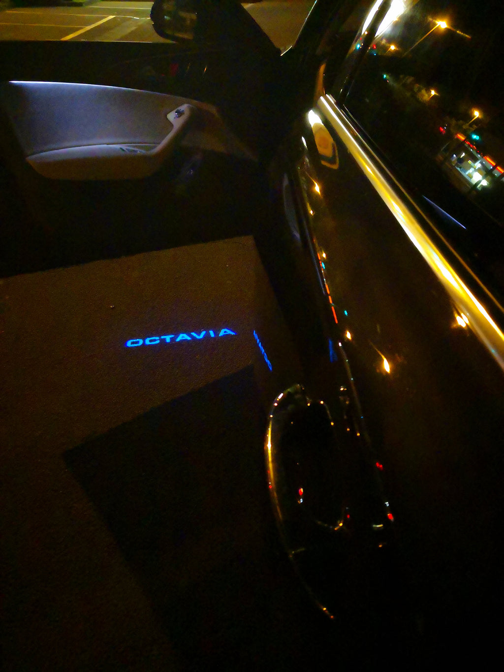 SKODA OCTAVIA LOGO PROJECTOT LIGHTS Nr.104 (quantity  1 =  2 Logo Film /  2 door lights)